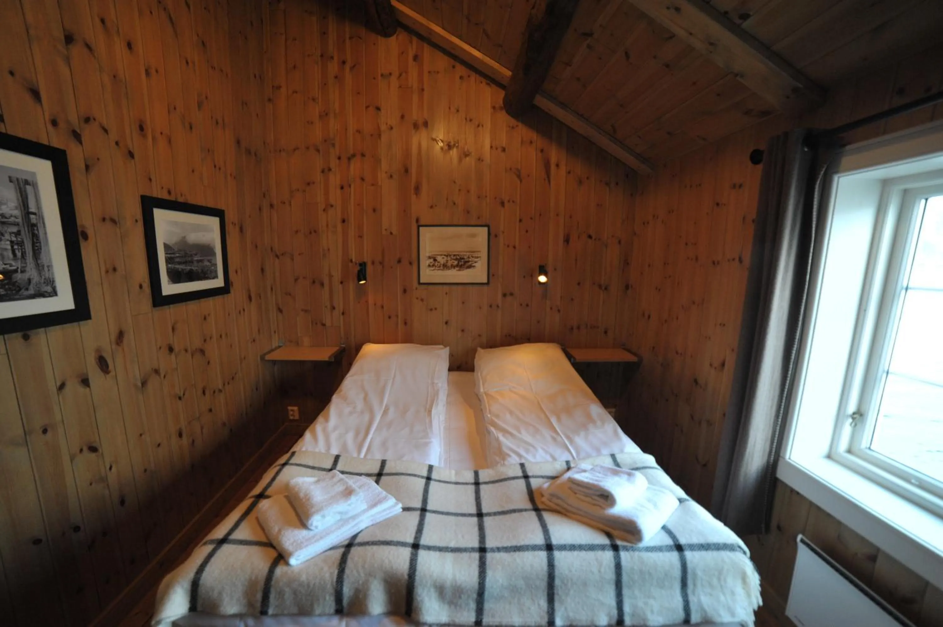 Bedroom, Bed in Reine Rorbuer - by Classic Norway Hotels