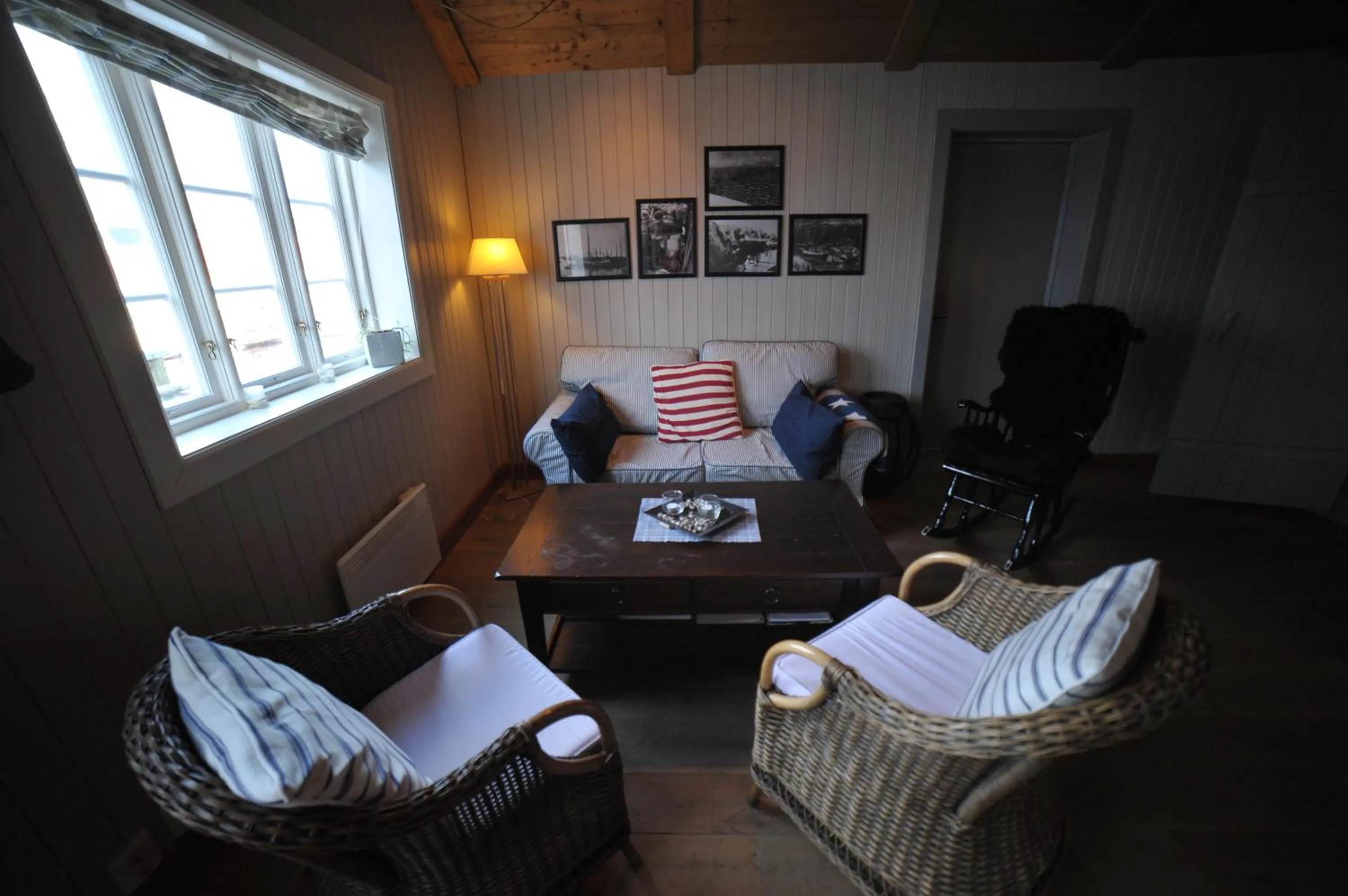Living room in Reine Rorbuer - by Classic Norway Hotels