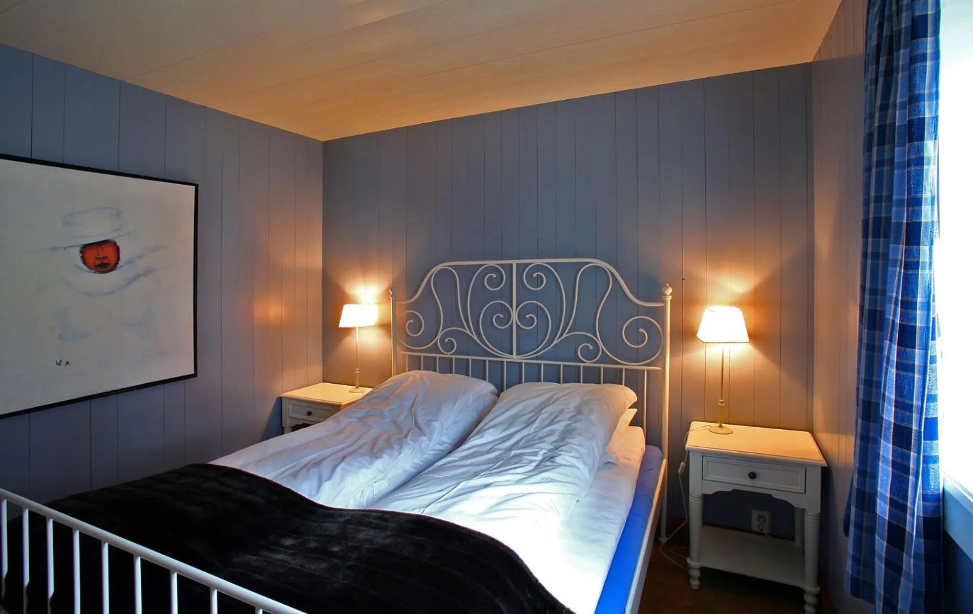 Bed in Reine Rorbuer - by Classic Norway Hotels