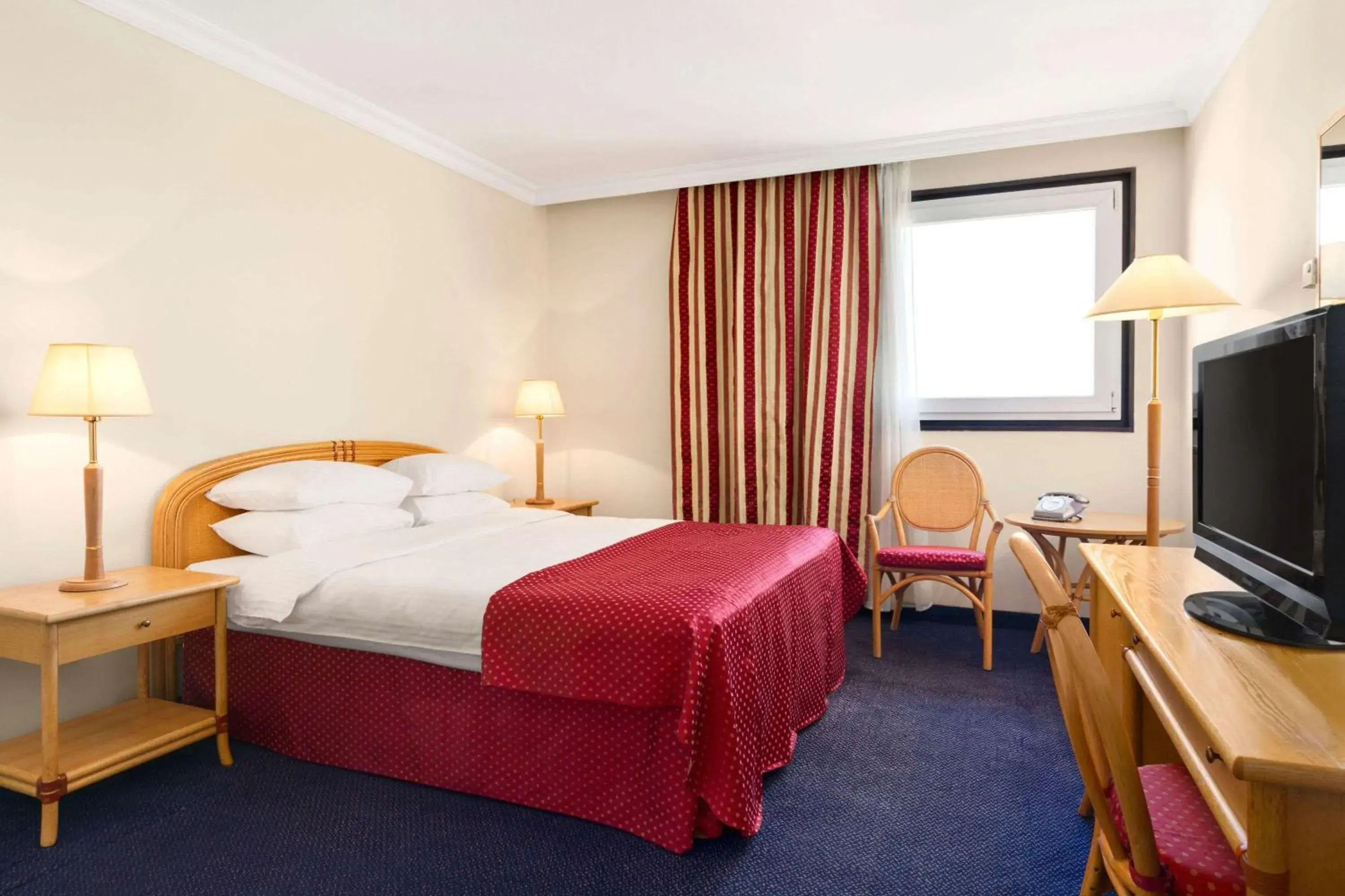 Photo of the whole room, Bed in Ramada by Wyndham Sofia City Center Photo of the whole room, Bed in Ramada by Wyndham Sofia City Center