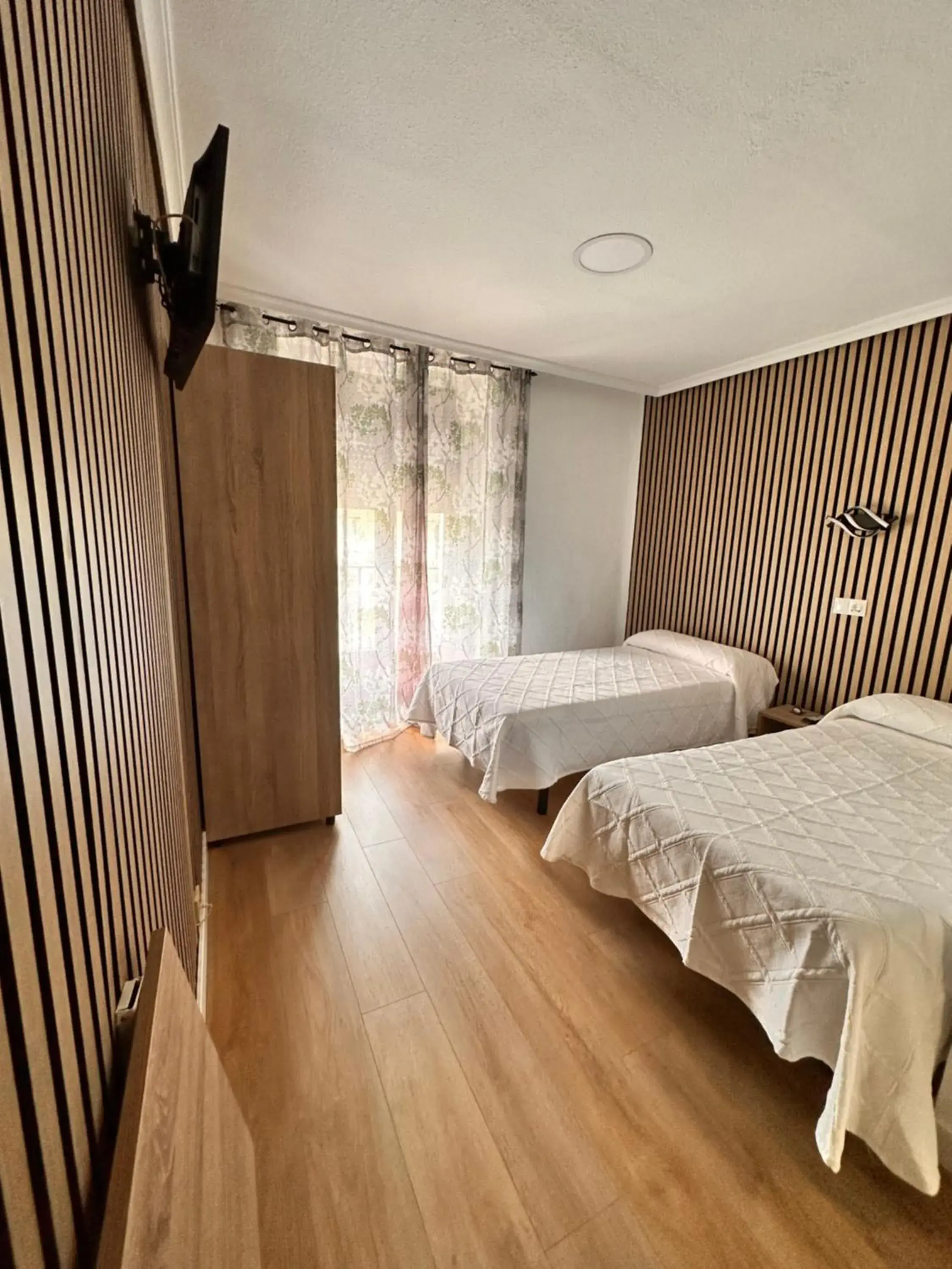 Photo of the whole room, Bed in Hostal Rober Photo of the whole room, Bed in Hostal Rober