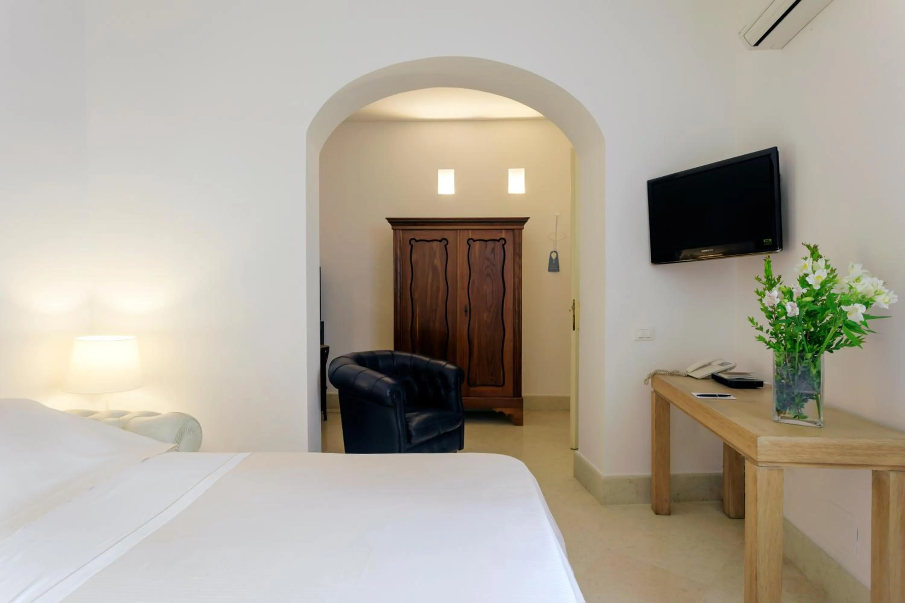 Photo of the whole room, Bed in Palazzo Brunaccini Boutique Hotel