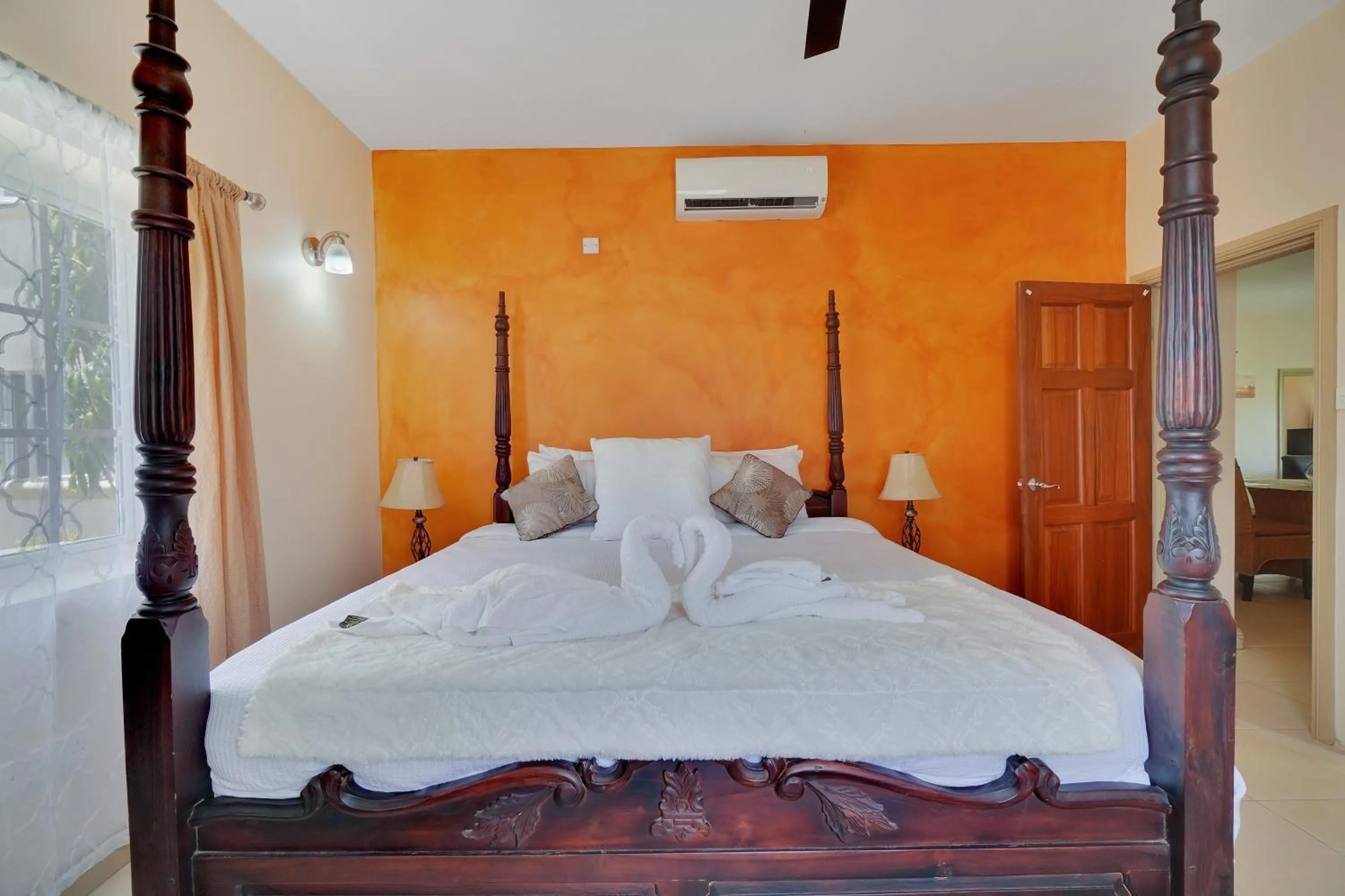 Bed in Mandela Court Suites Grenada