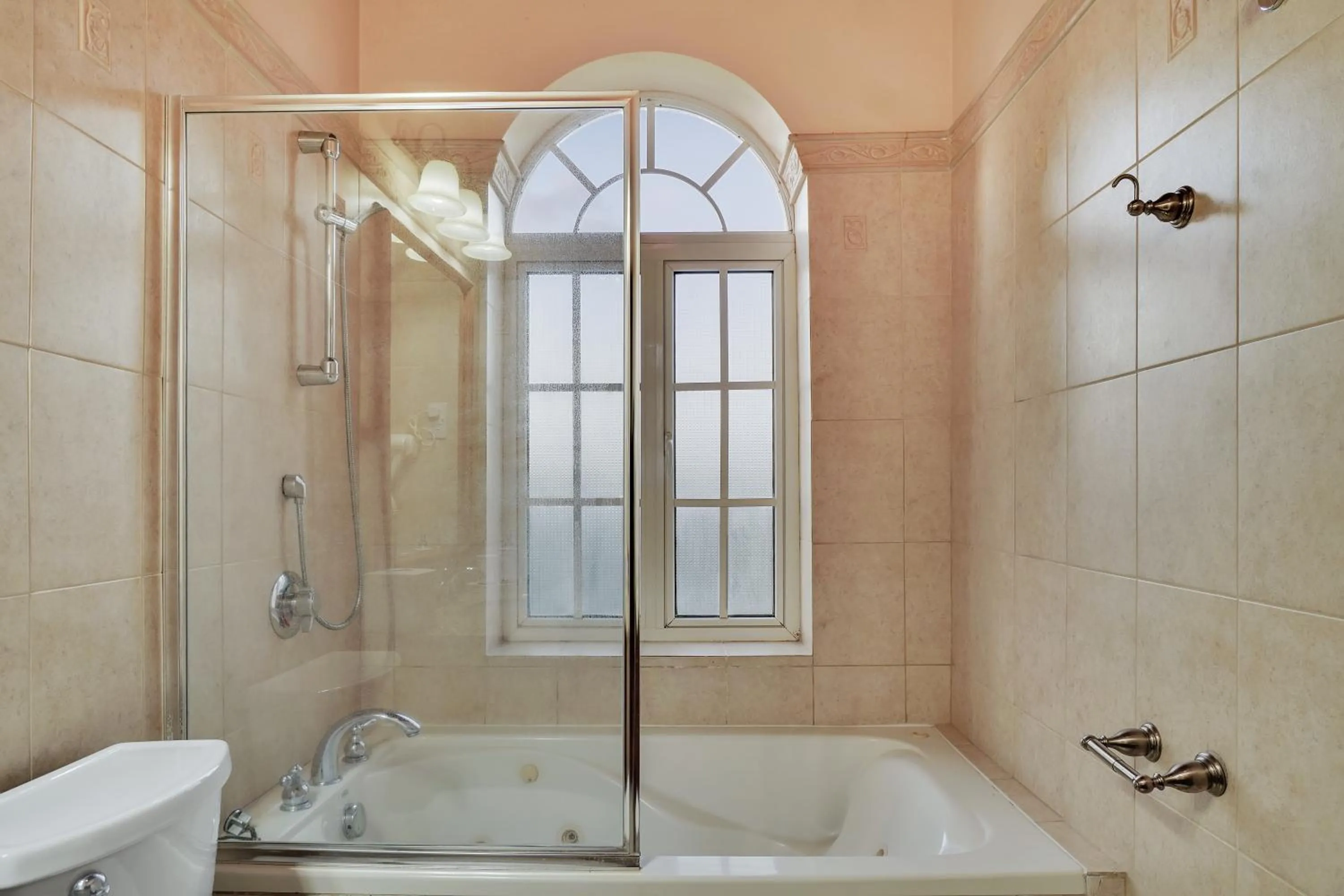 Shower in Mandela Court Suites Grenada