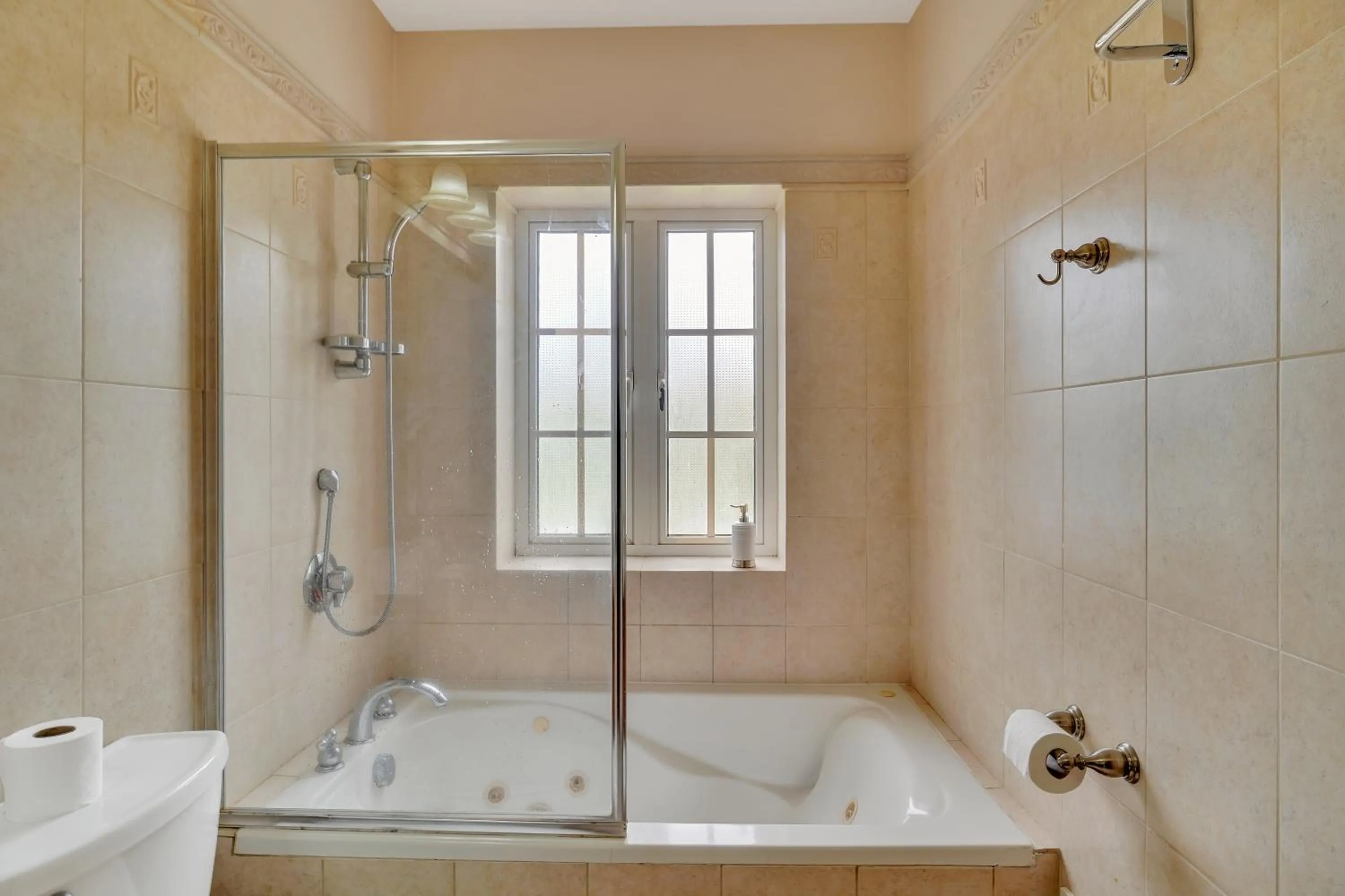 Shower in Mandela Court Suites Grenada