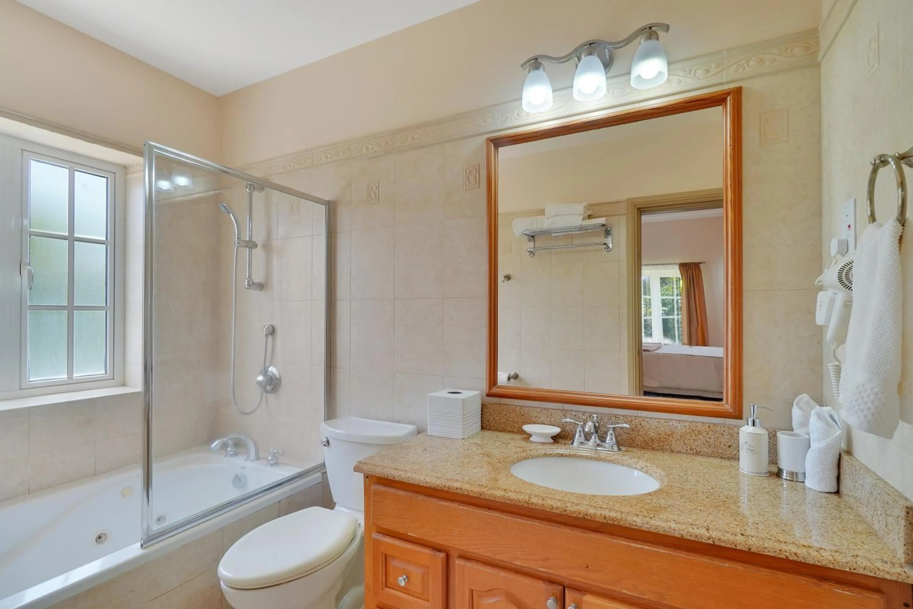 Shower in Mandela Court Suites Grenada