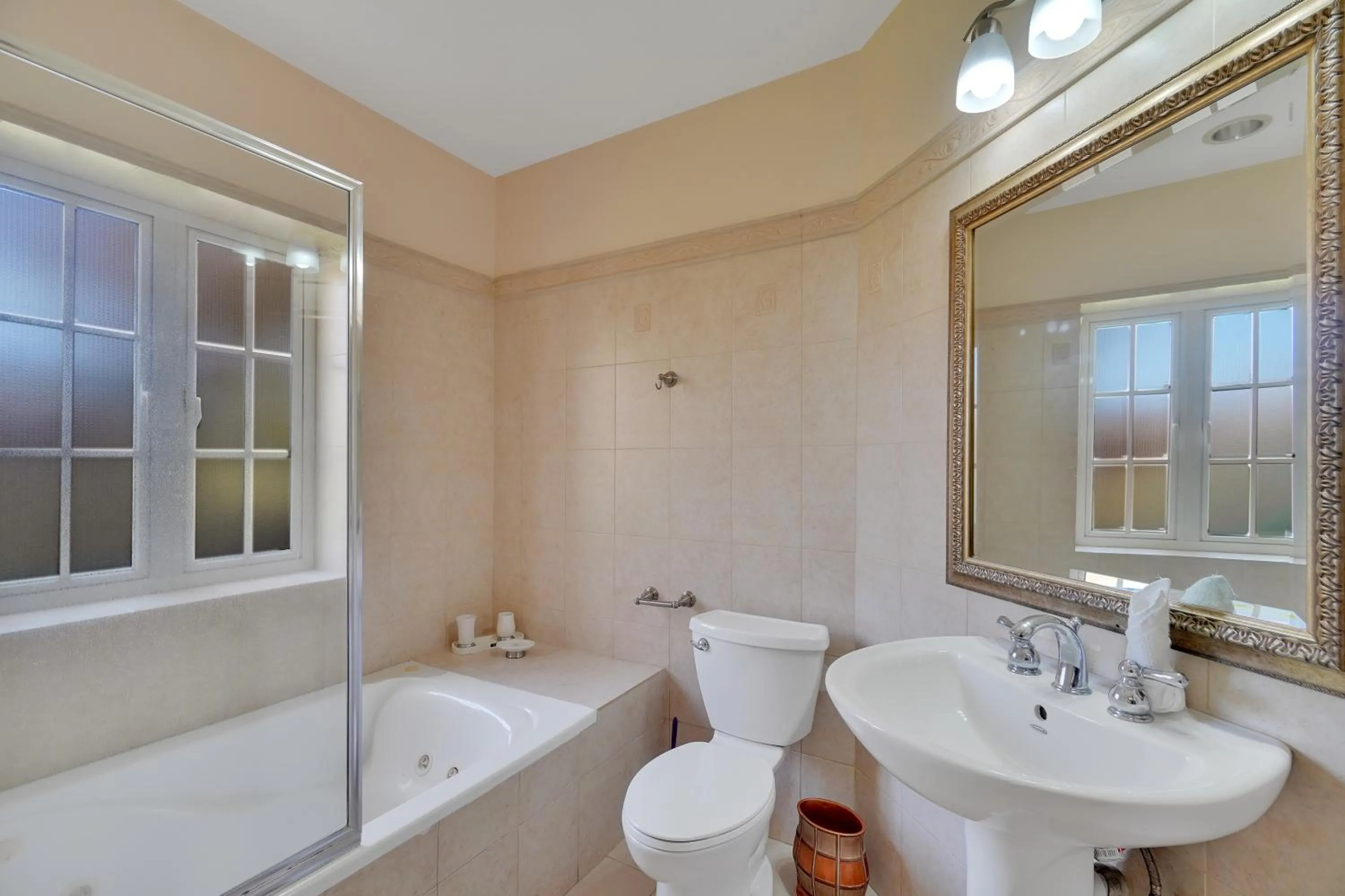 Shower in Mandela Court Suites Grenada