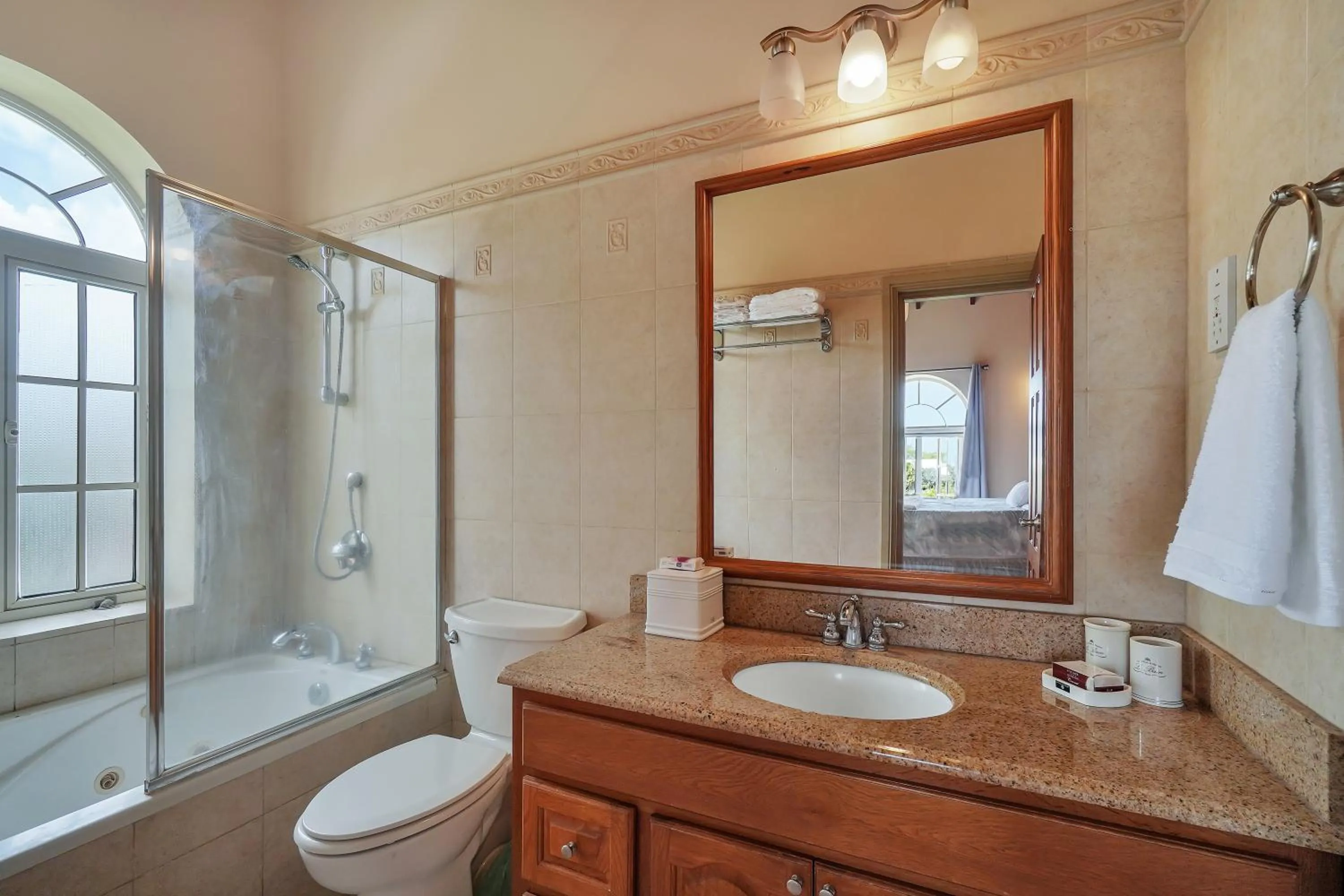 Shower in Mandela Court Suites Grenada