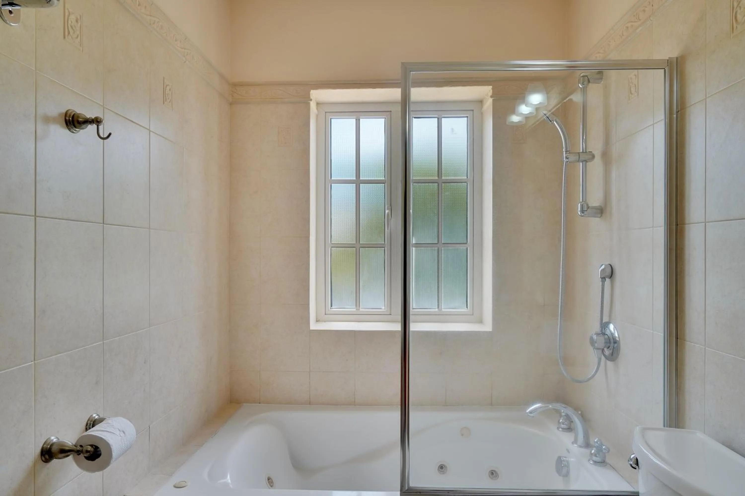 Shower in Mandela Court Suites Grenada