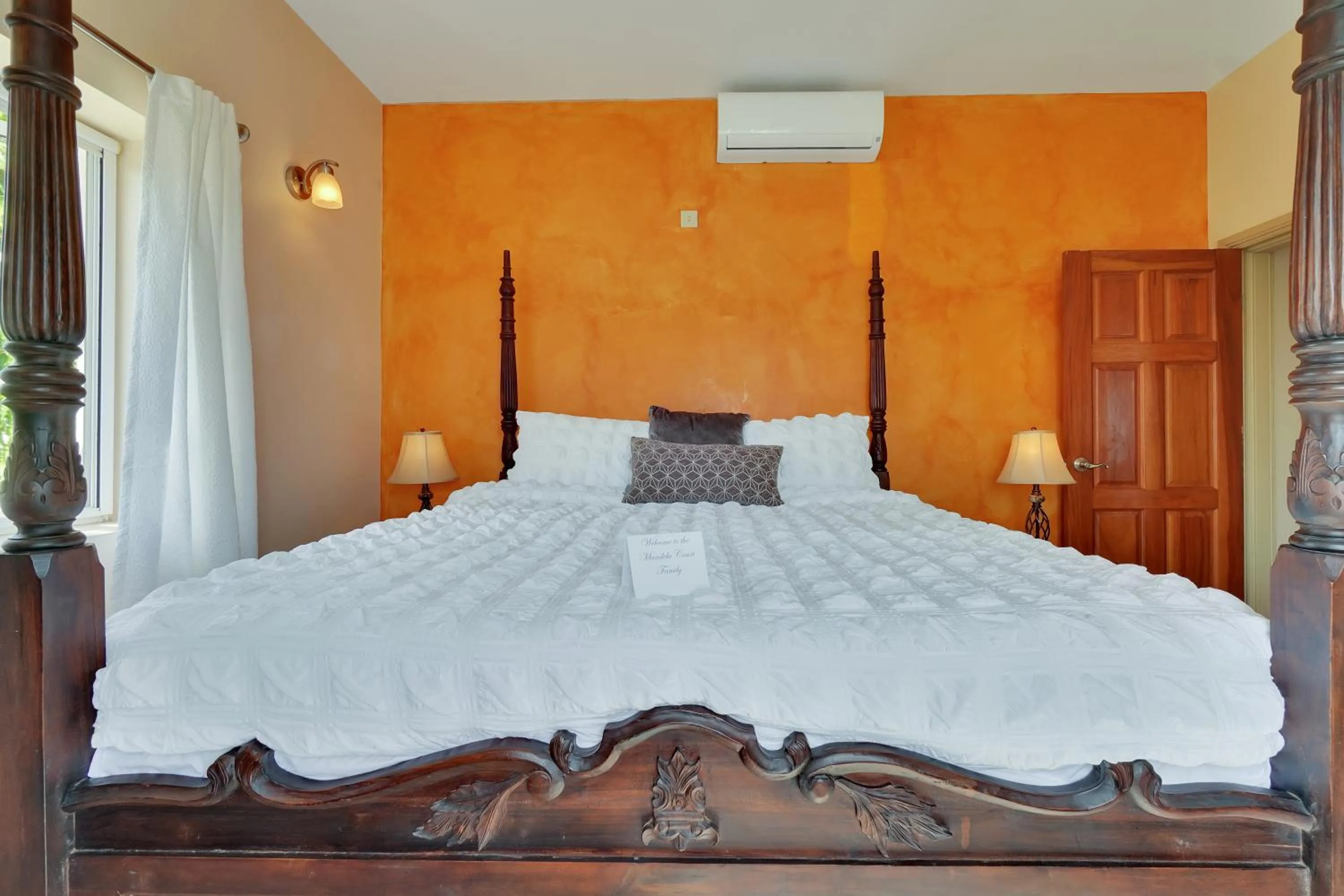 Bed in Mandela Court Suites Grenada