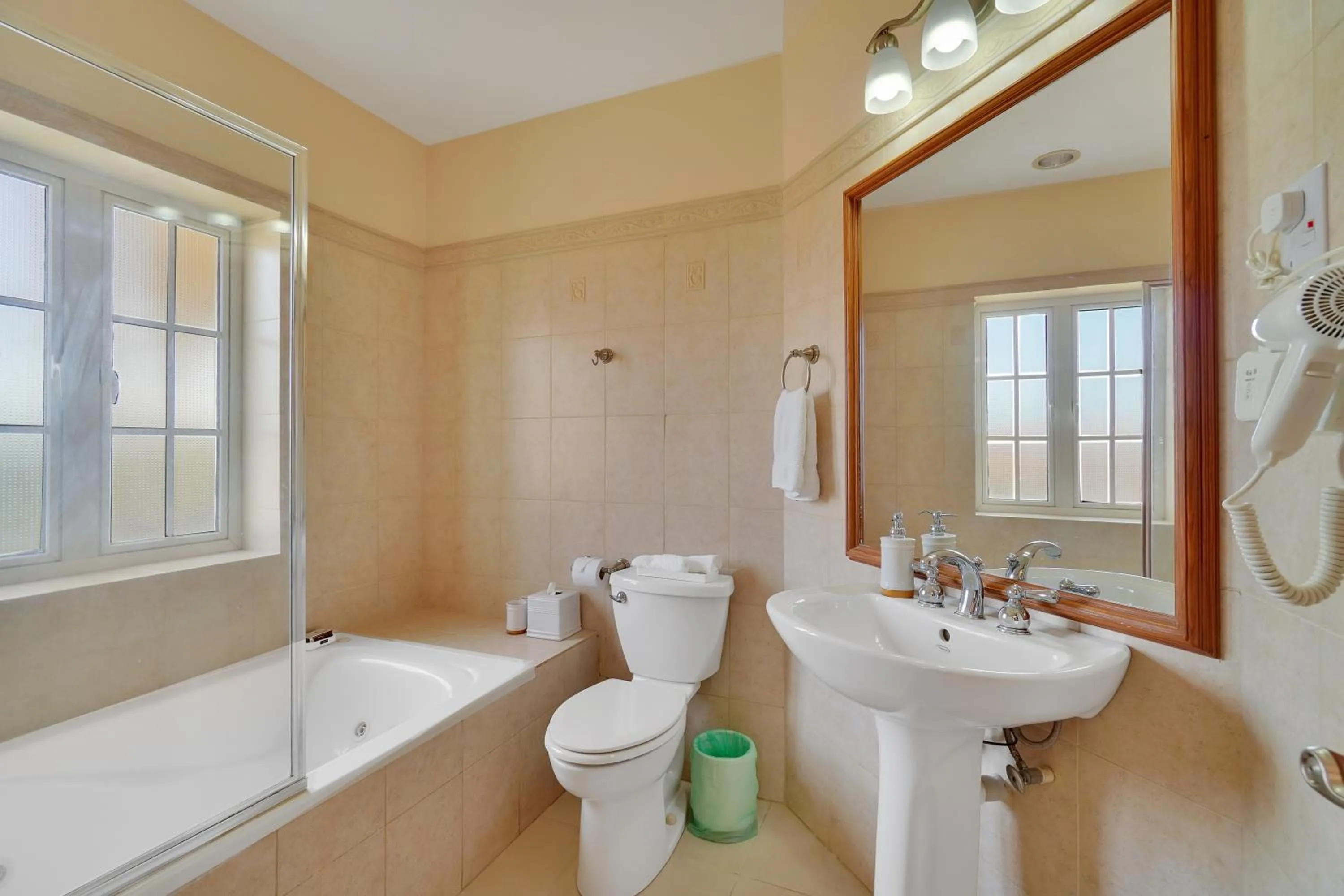 Shower in Mandela Court Suites Grenada