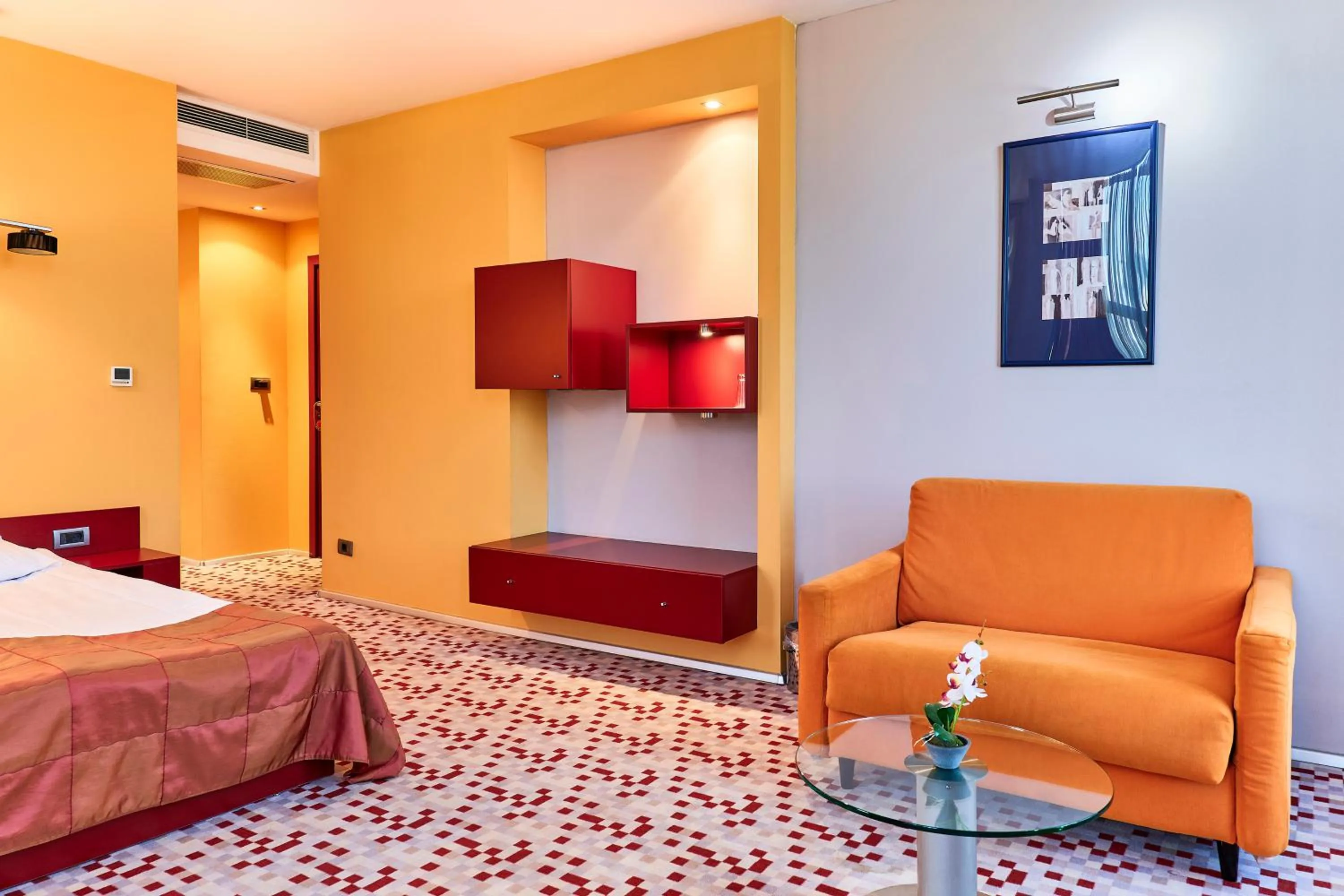 Seating area, Bed in Monet Hotel