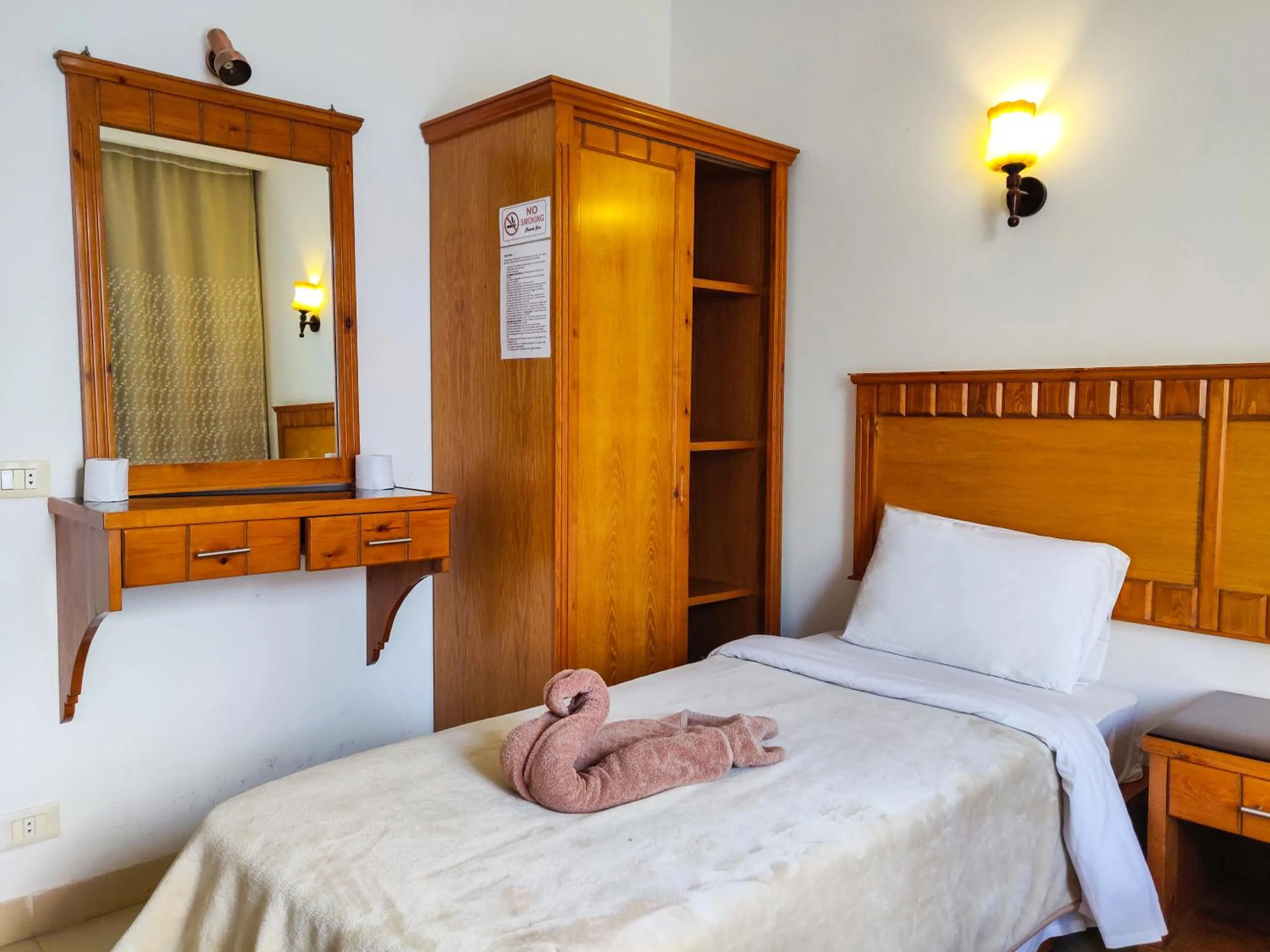 Bed in New Yalla Hotel