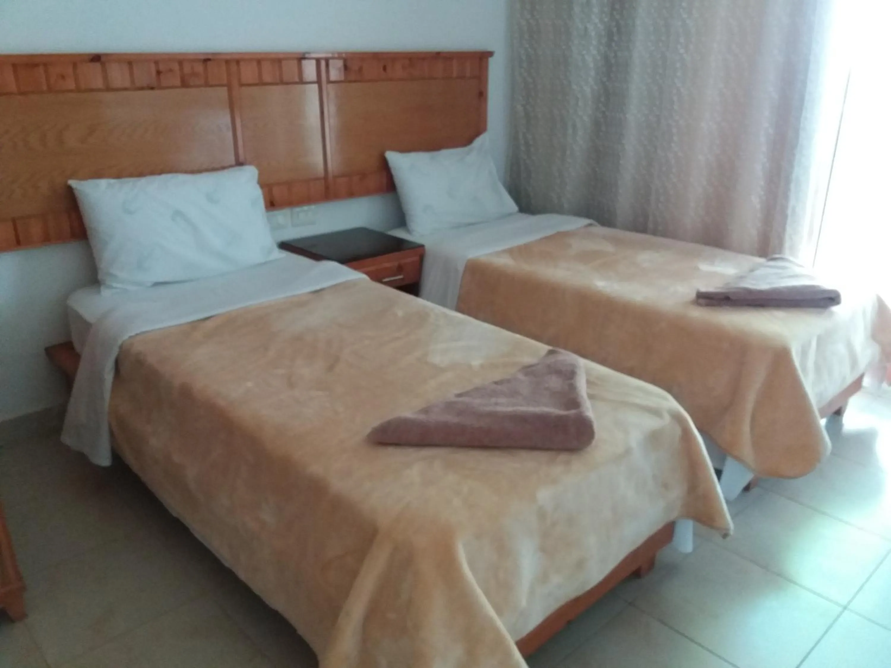 Photo of the whole room, Bed in New Yalla Hotel