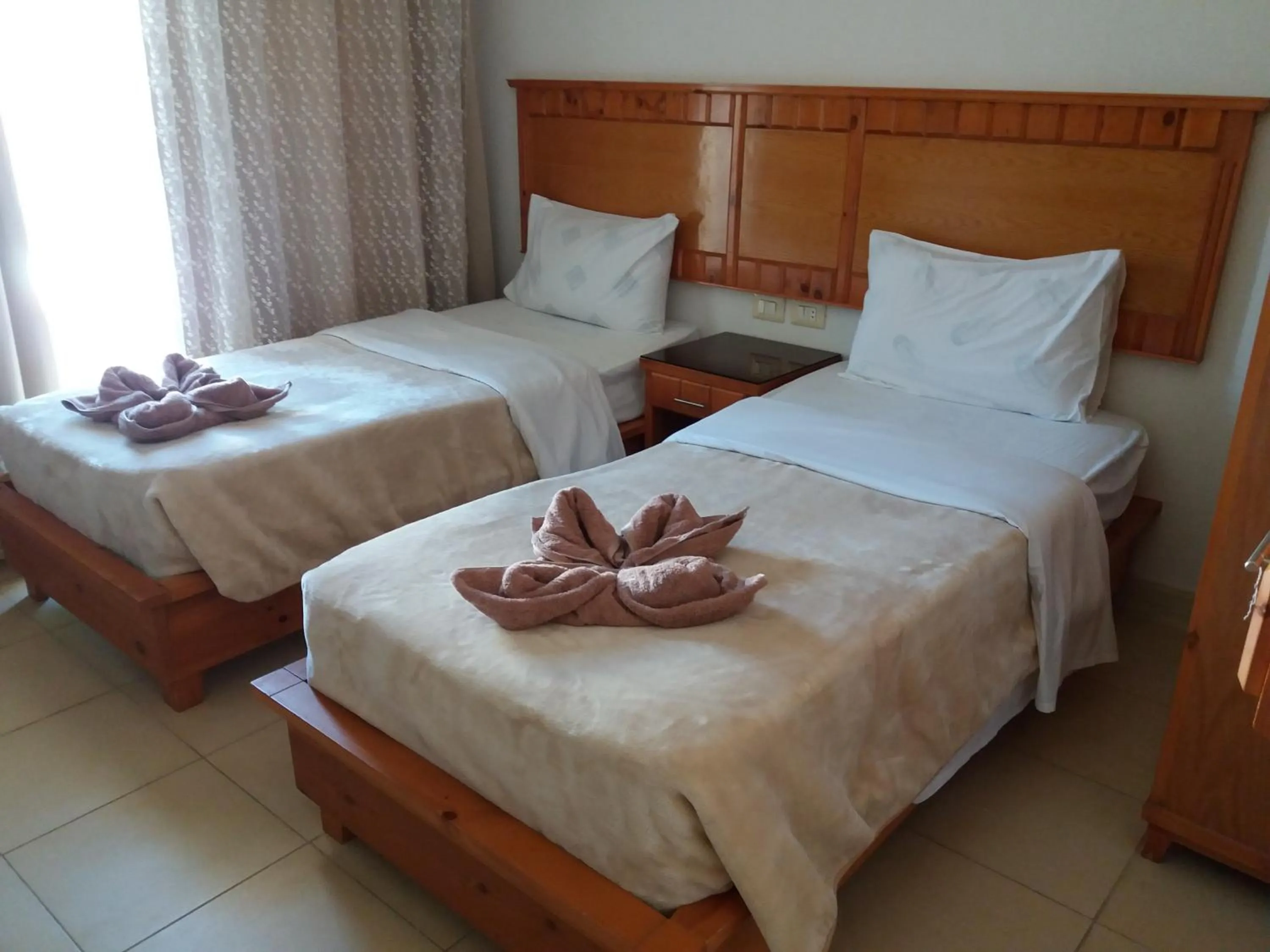 Photo of the whole room, Bed in New Yalla Hotel