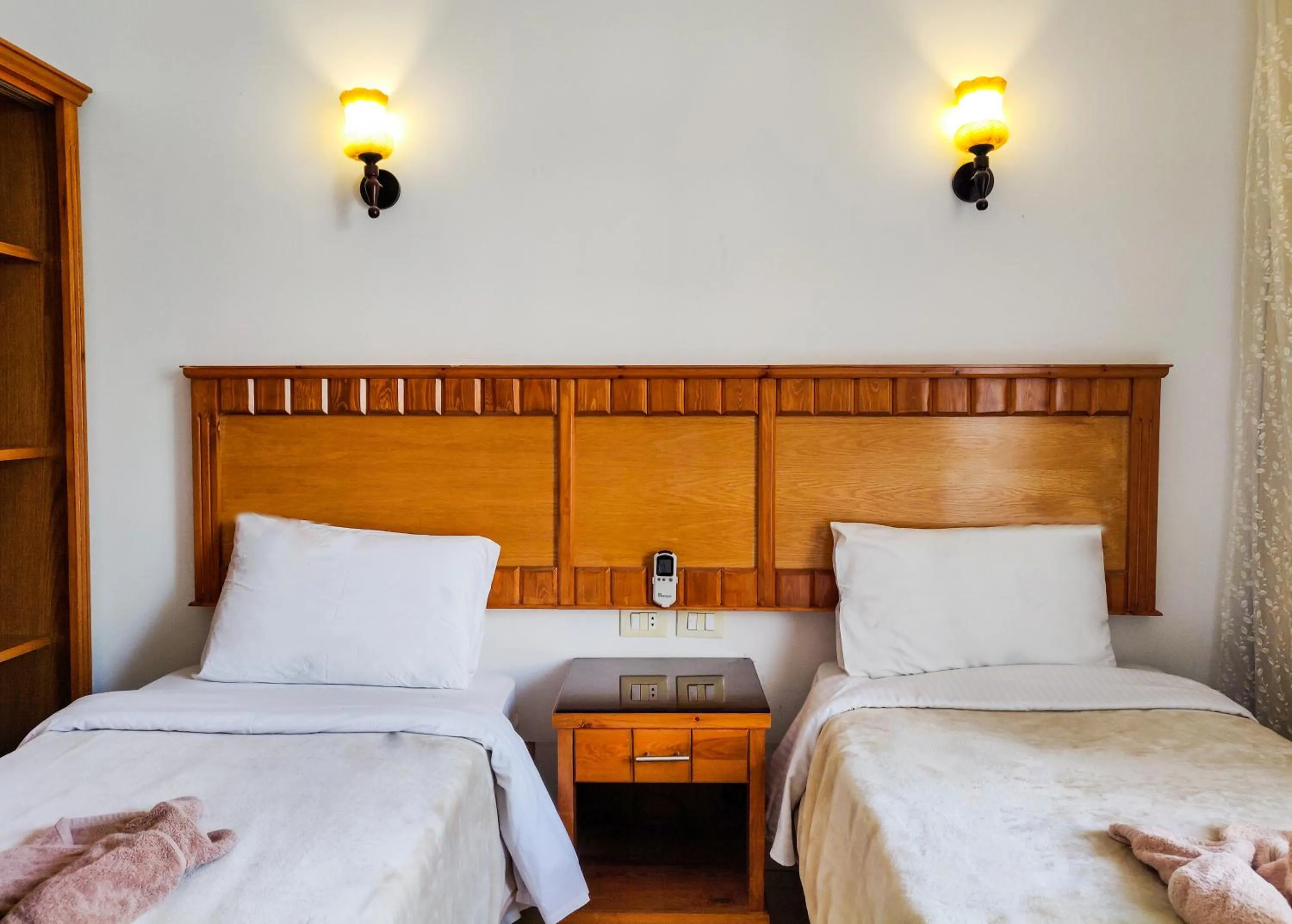 Bed in New Yalla Hotel