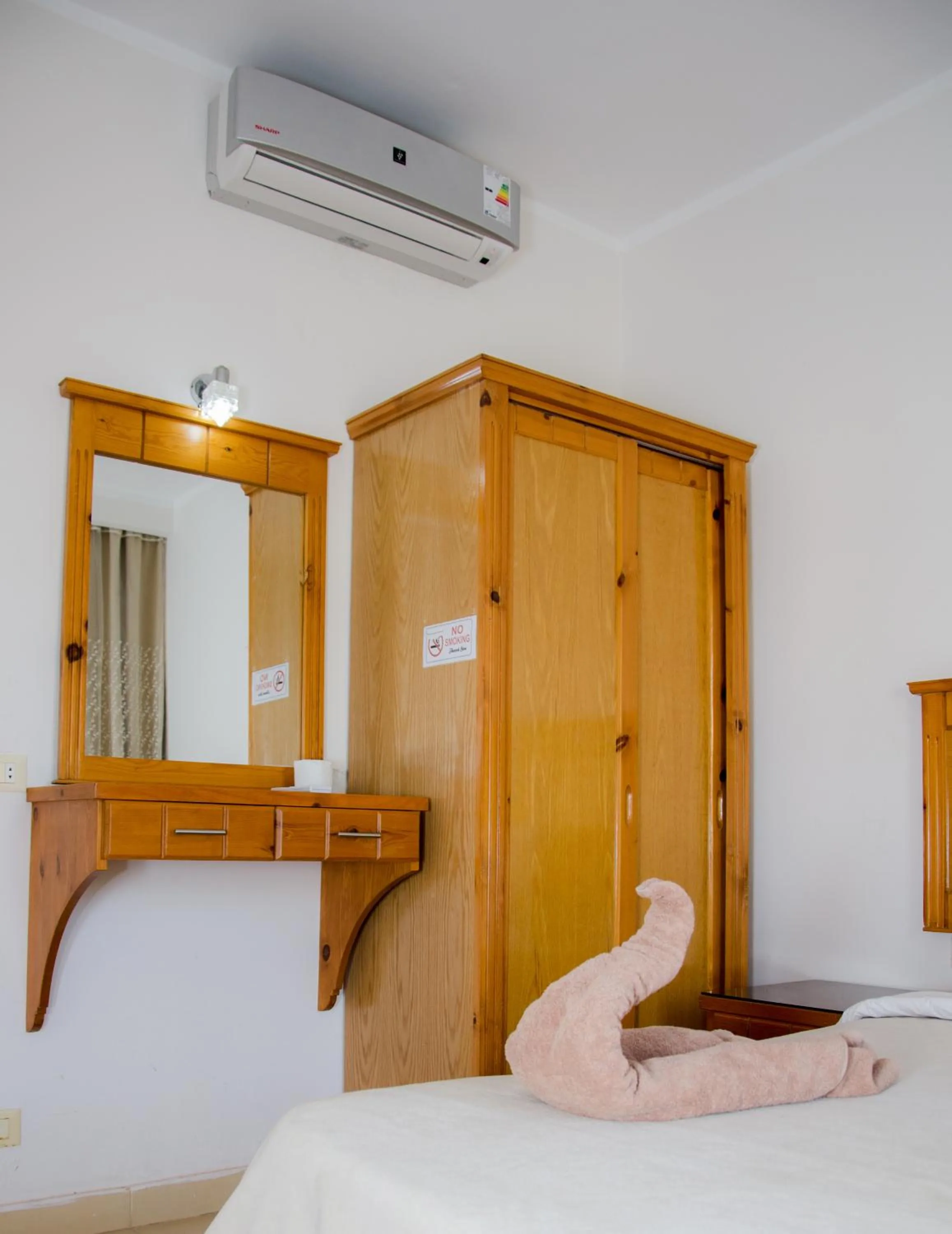 Bed in New Yalla Hotel