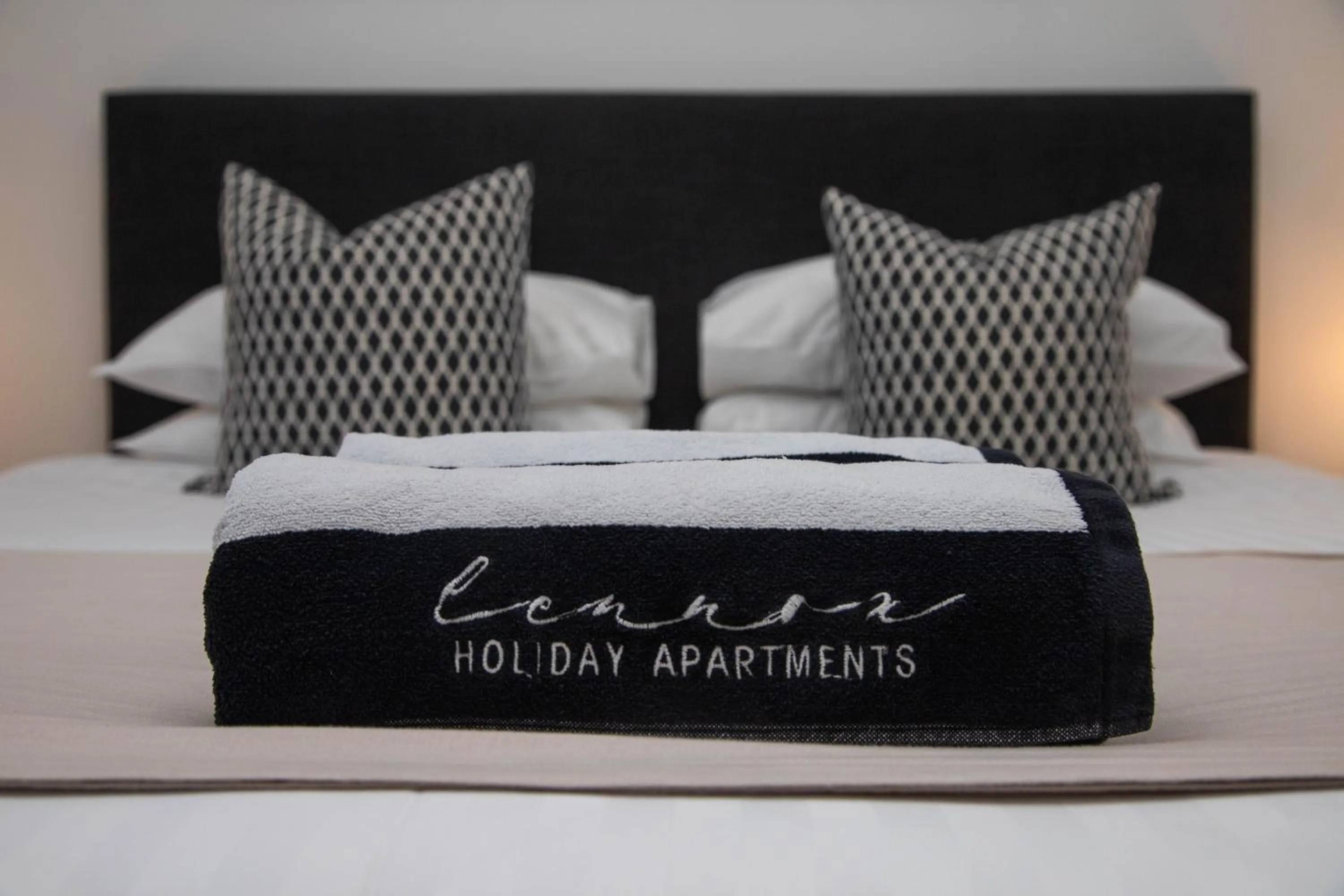 Property logo or sign, Bed in Lennox Holiday Apartments