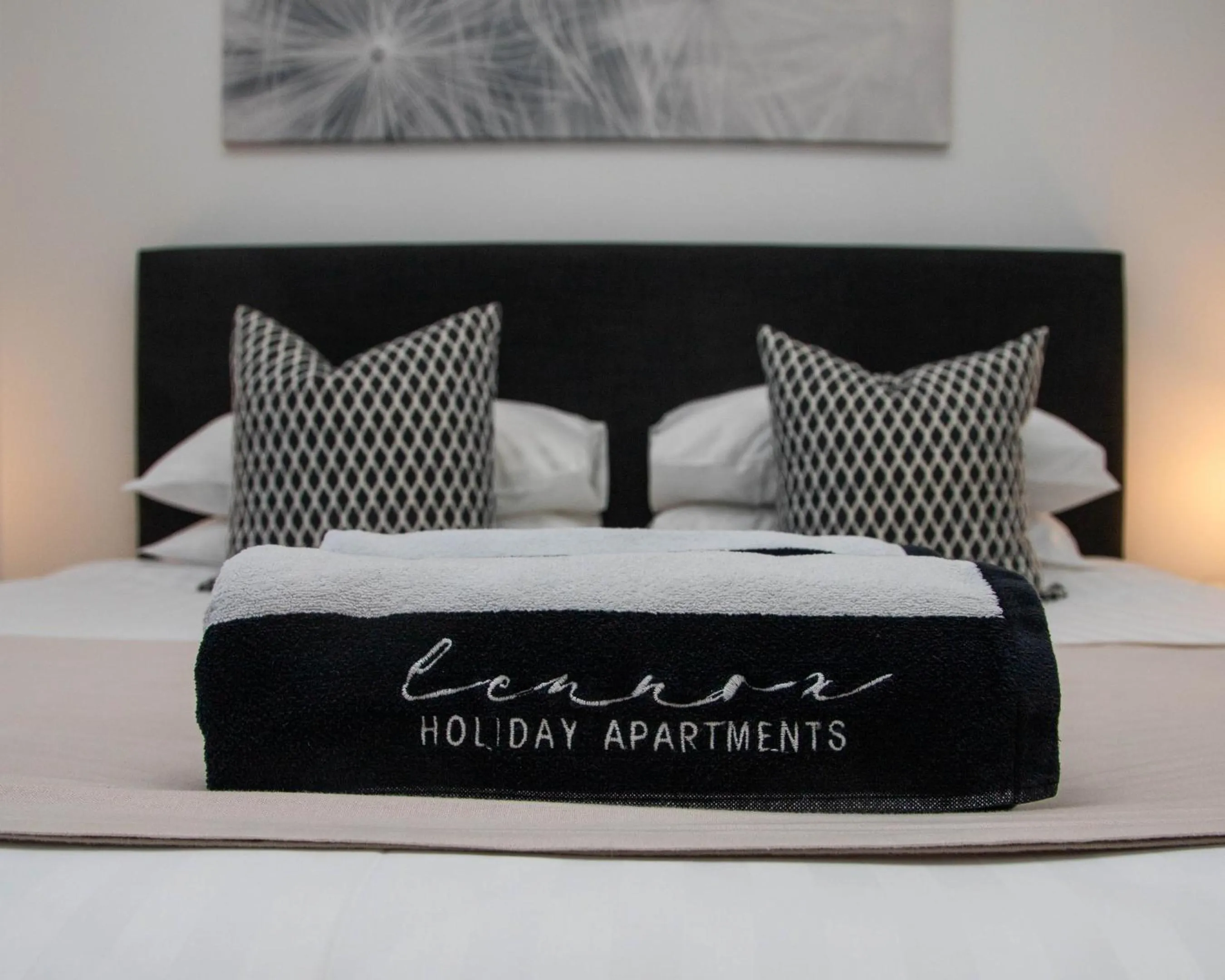 Property logo or sign, Bed in Lennox Holiday Apartments