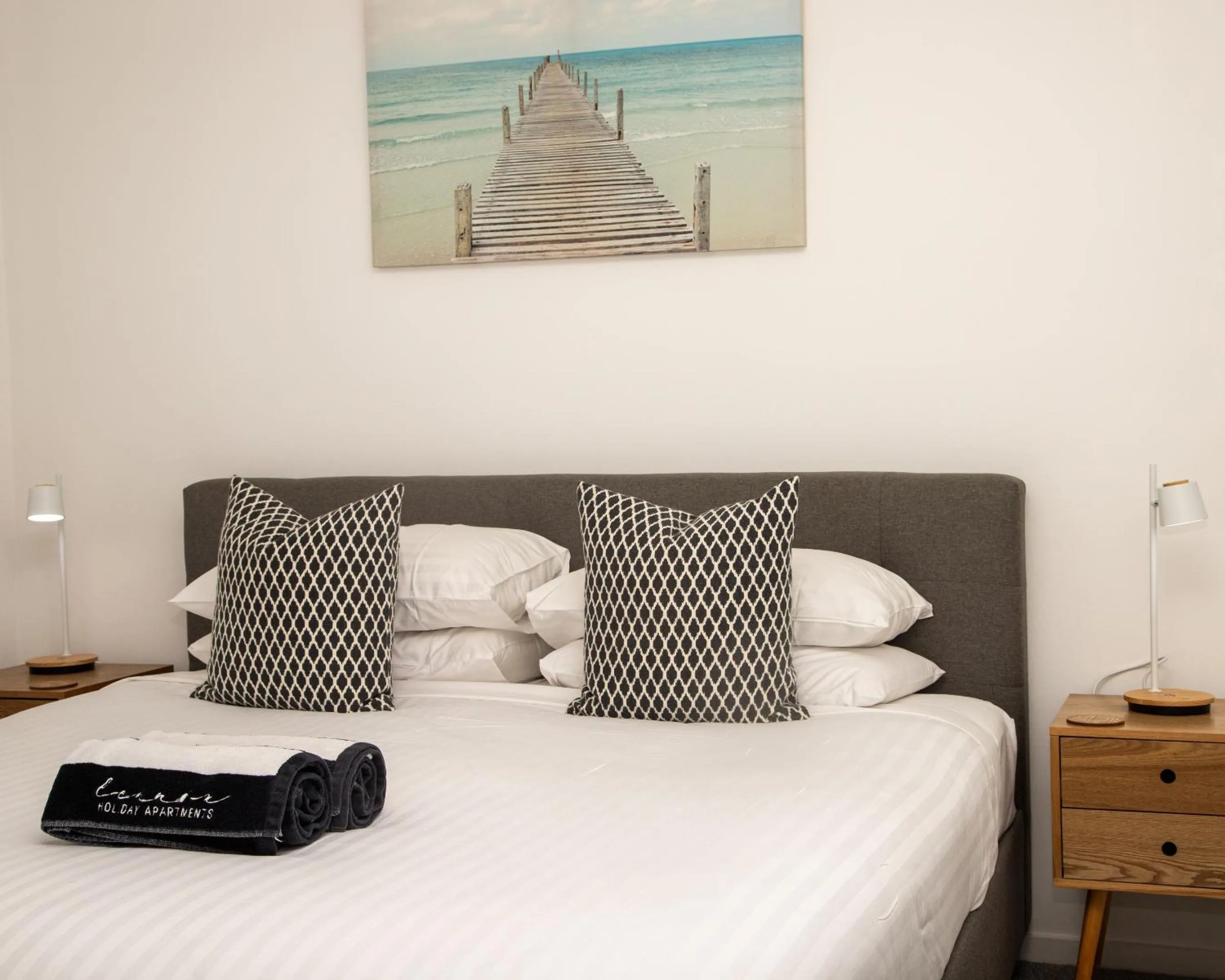 Bed in Lennox Holiday Apartments