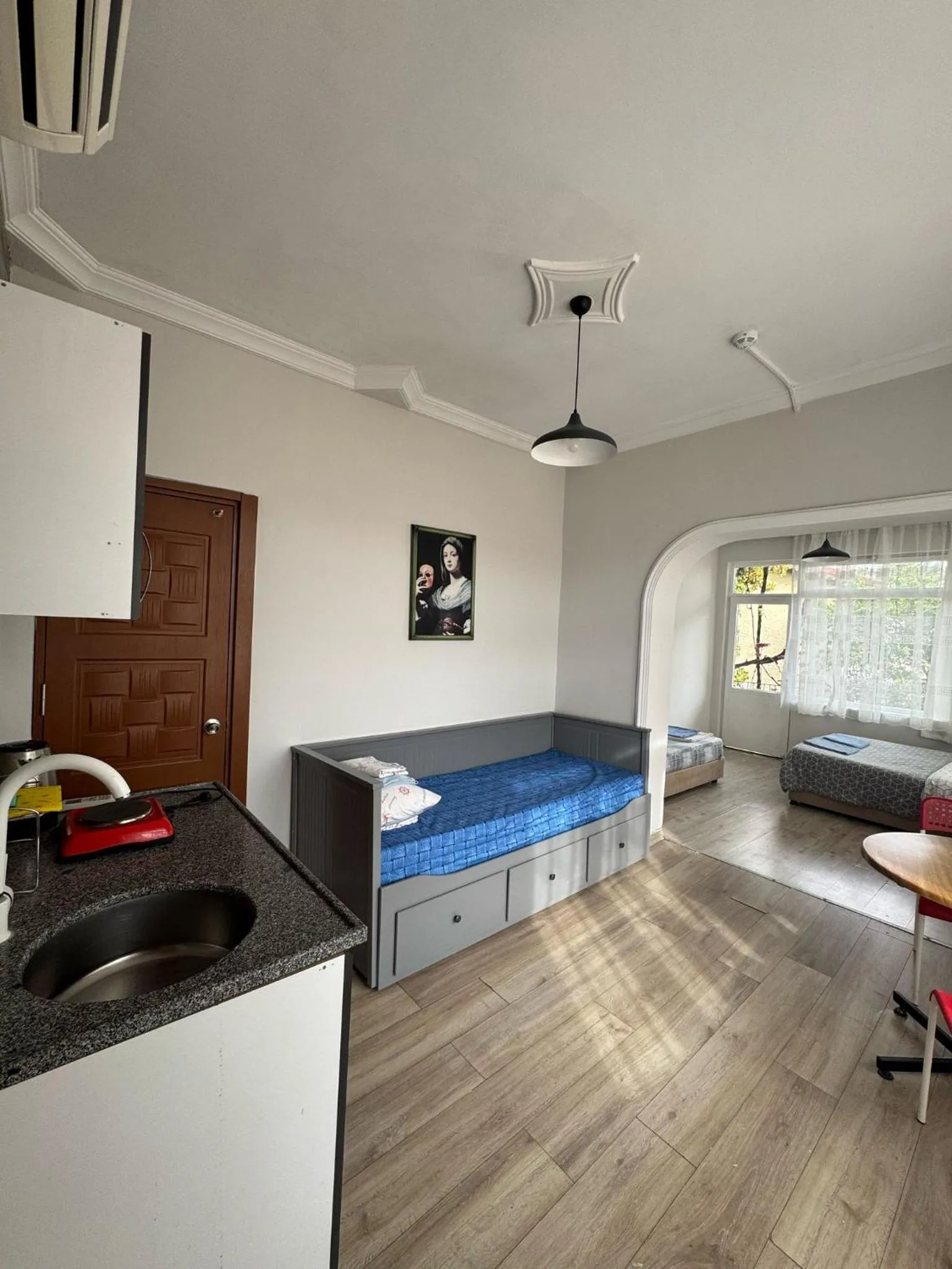 Seating area, Bed in Erkal Pension