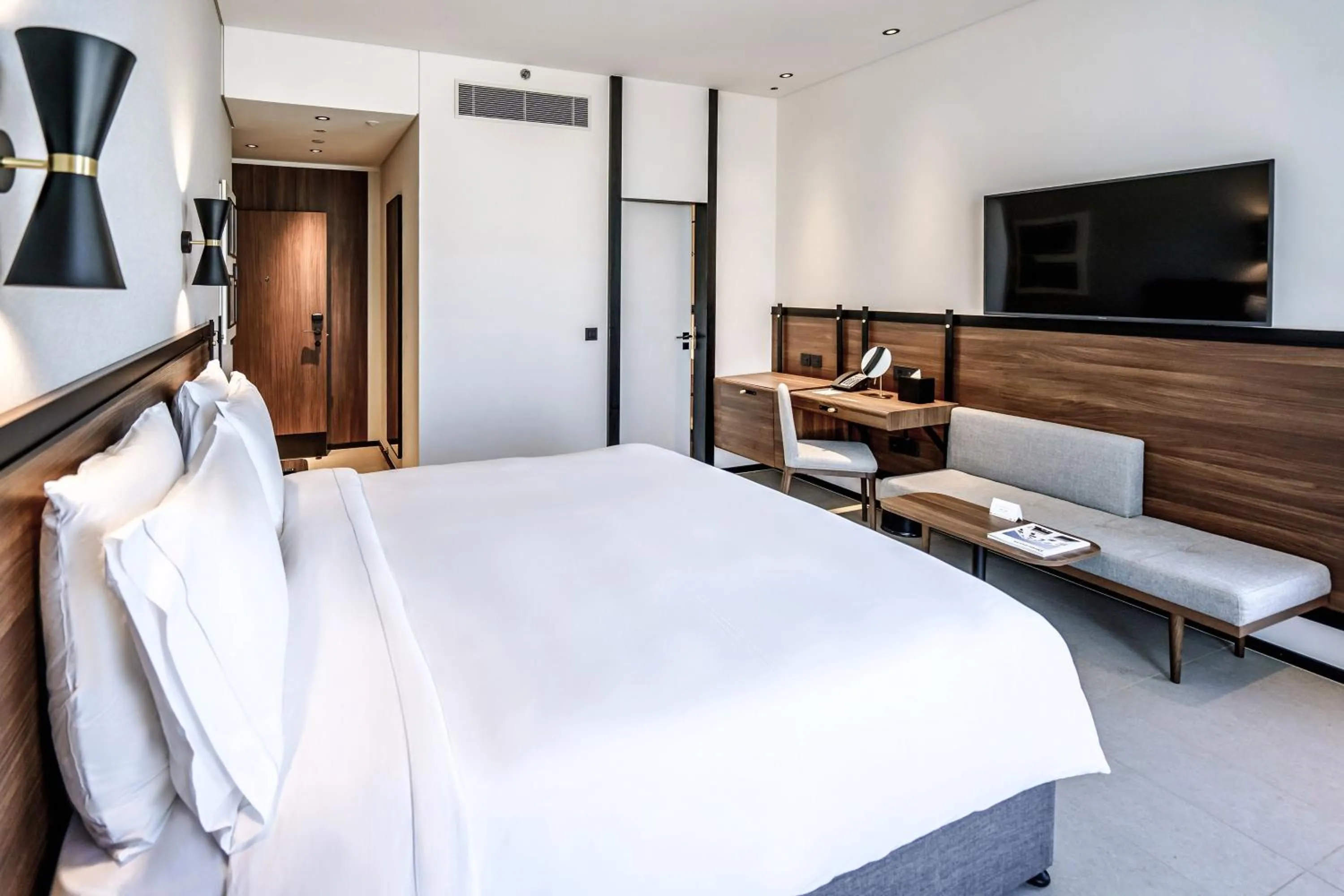 Bedroom, Bed in FORM Hotel Al Jaddaf, Dubai, a Member of Design Hotels