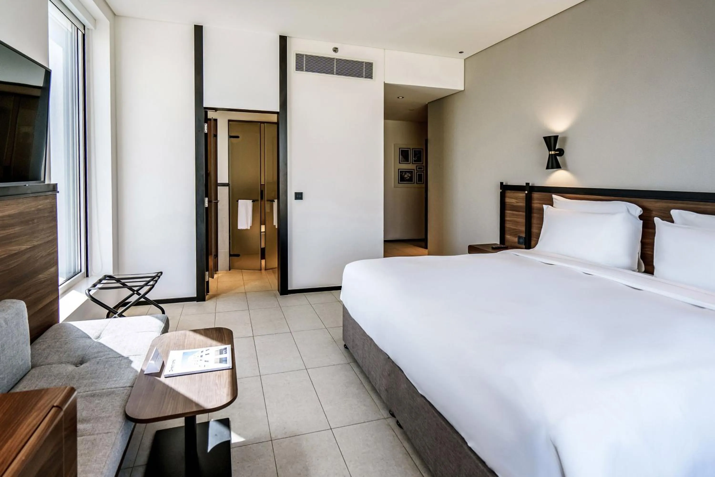 Photo of the whole room, Bed in FORM Hotel Al Jaddaf, Dubai, a Member of Design Hotels