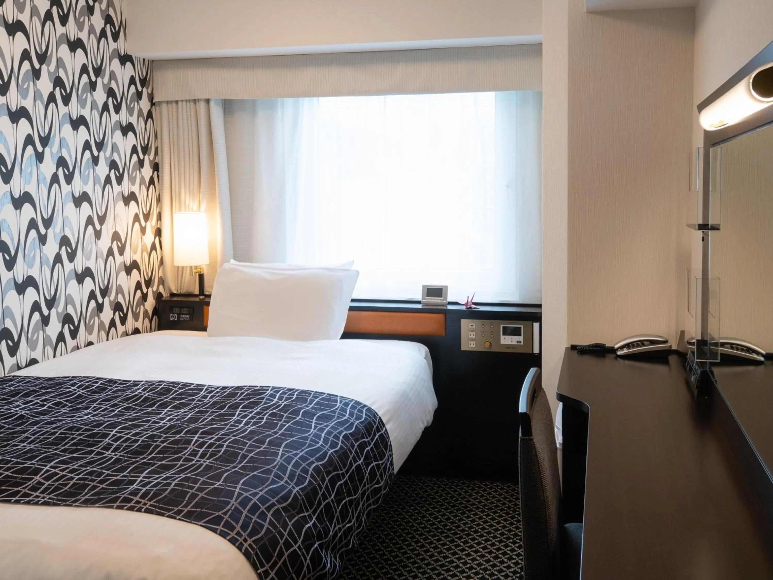 Bed in APA Hotel Nihombashi Bakurocho Ekikita