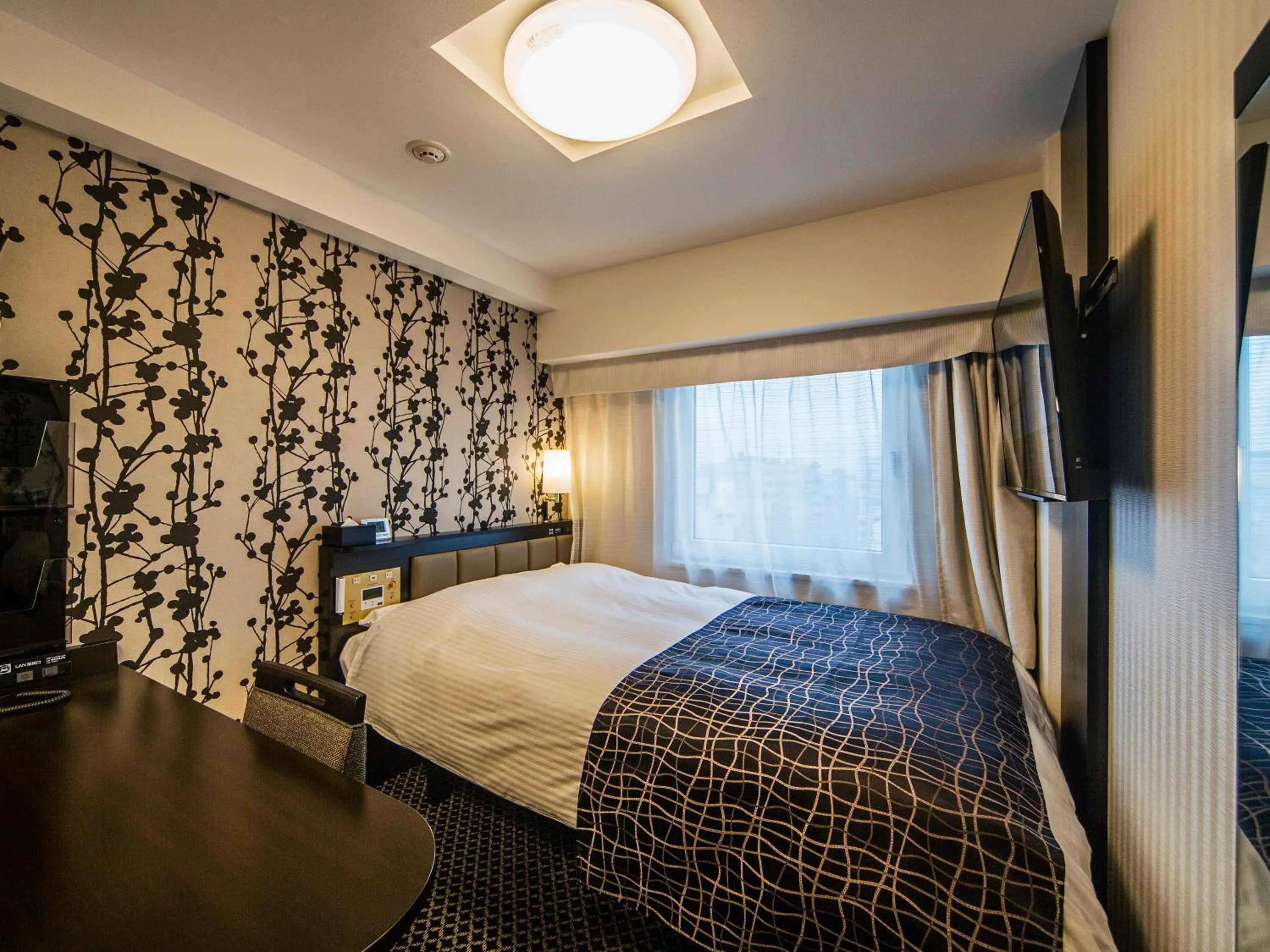 Bed in APA Hotel Nihombashi Bakurocho Ekikita