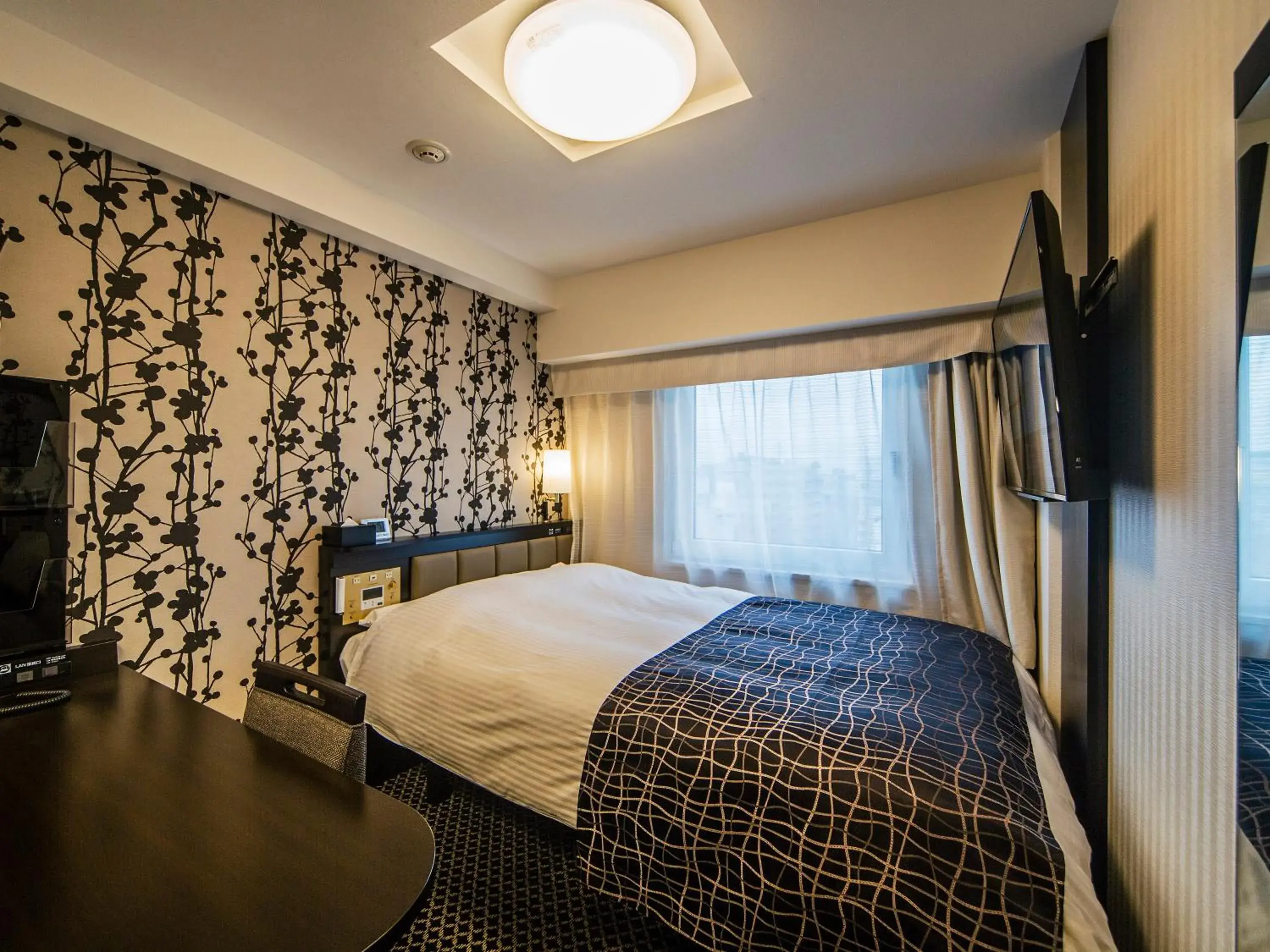 Bed in APA Hotel Nihombashi Bakurocho Ekikita Bed in APA Hotel Nihombashi Bakurocho Ekikita