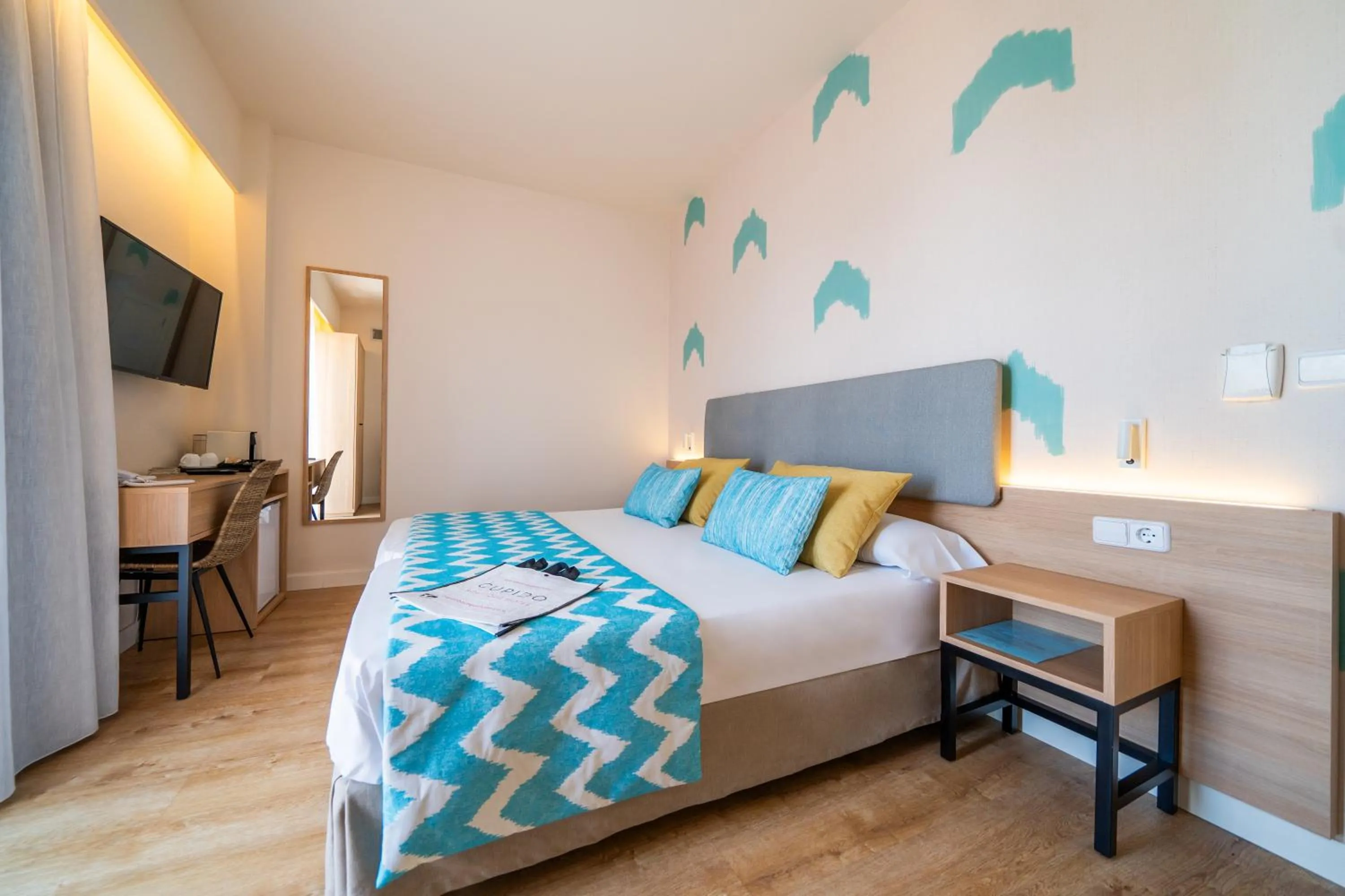 Bed in Cupido Boutique Hotel