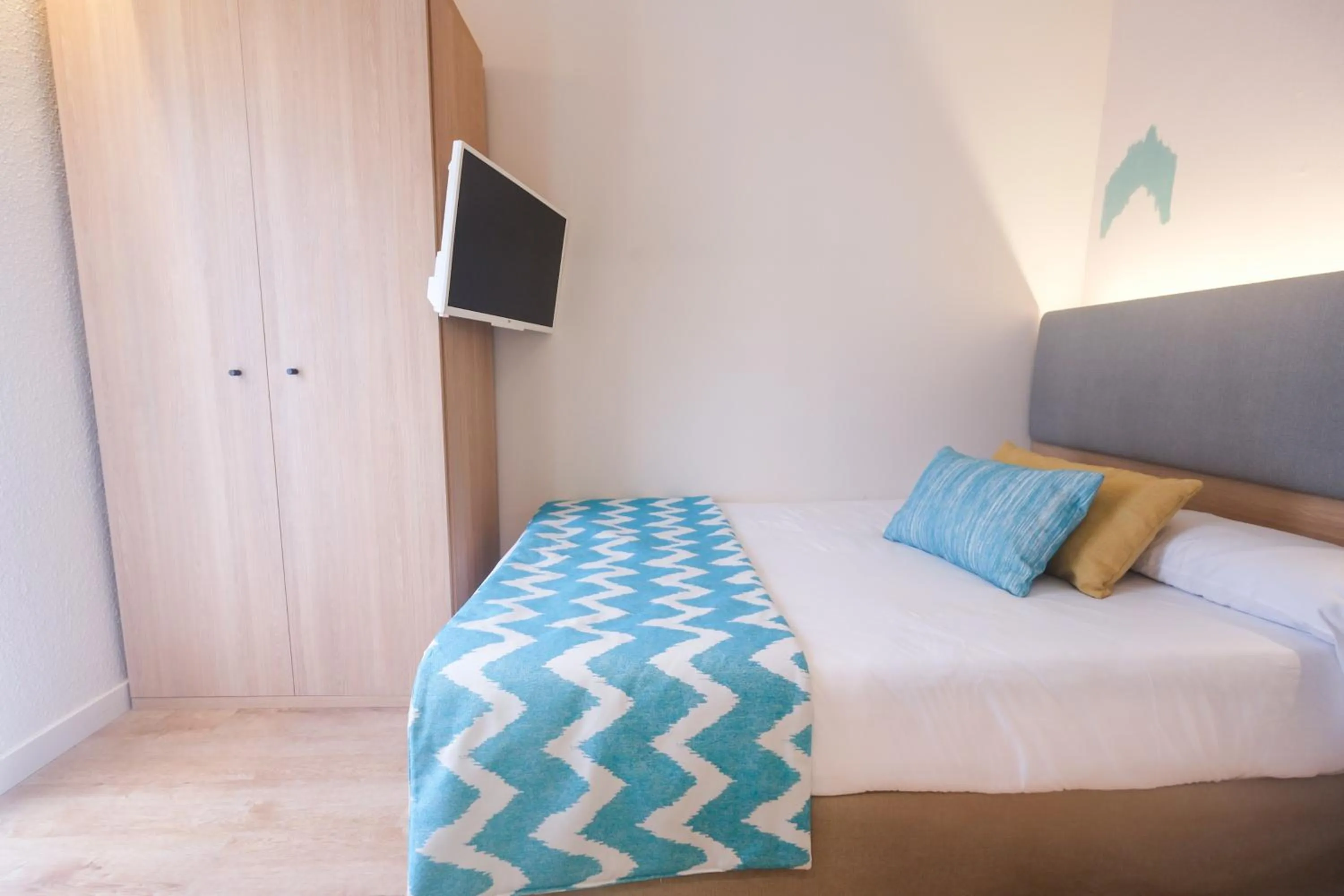 Bed in Cupido Boutique Hotel