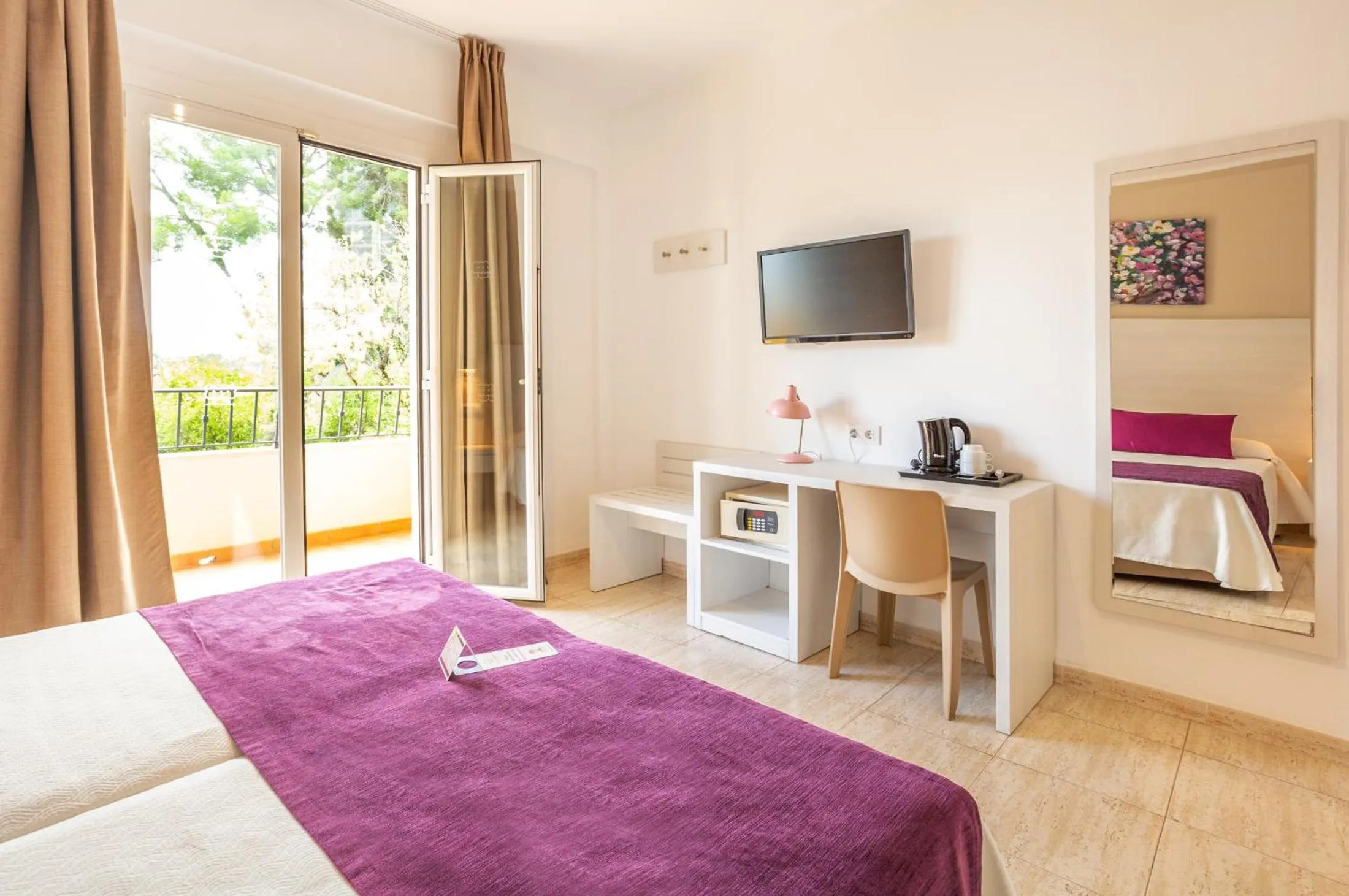 Bed in FLOR los Almendros Hotel