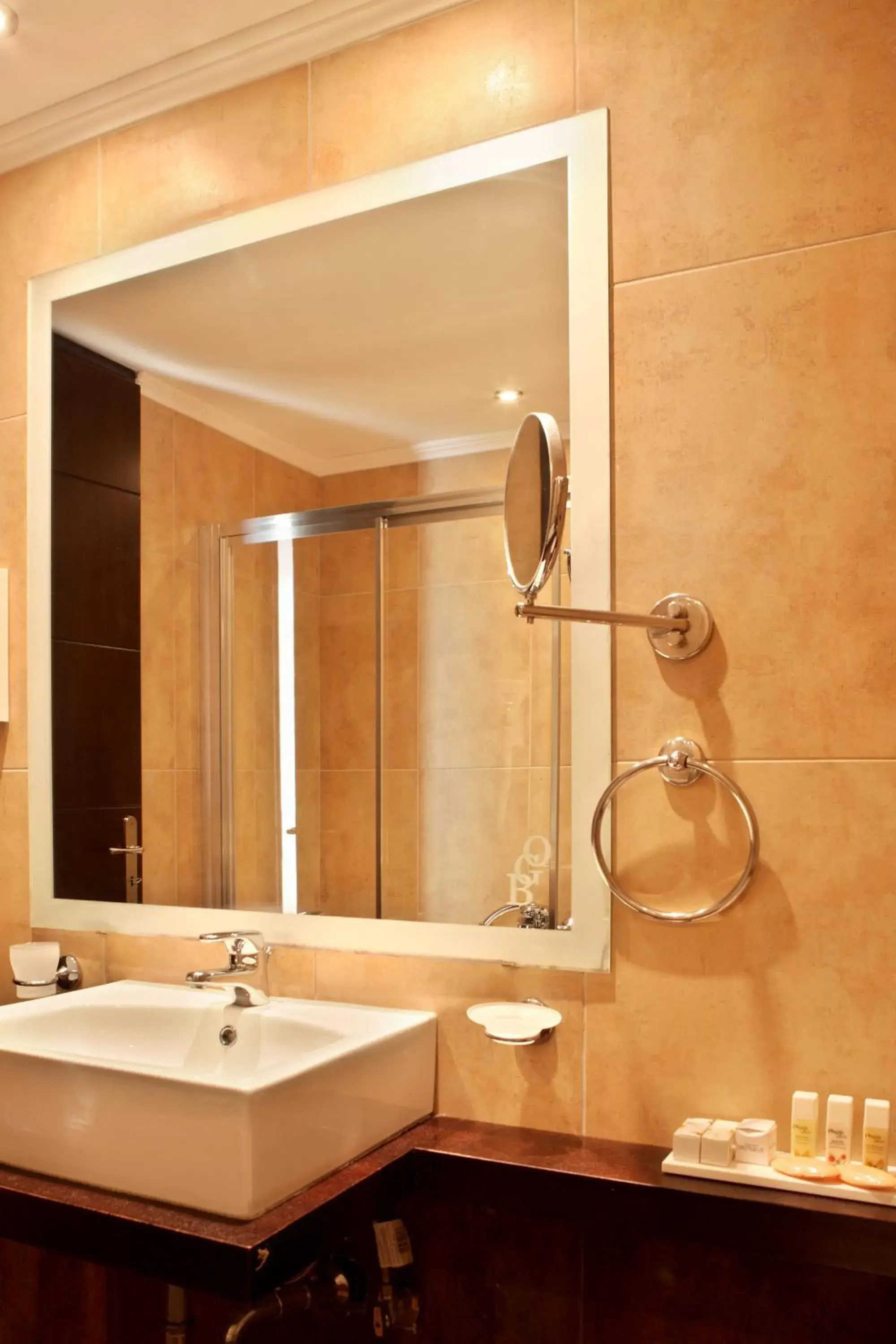 Bathroom in Olympia Golden Beach Resort & Spa Bathroom in Olympia Golden Beach Resort & Spa