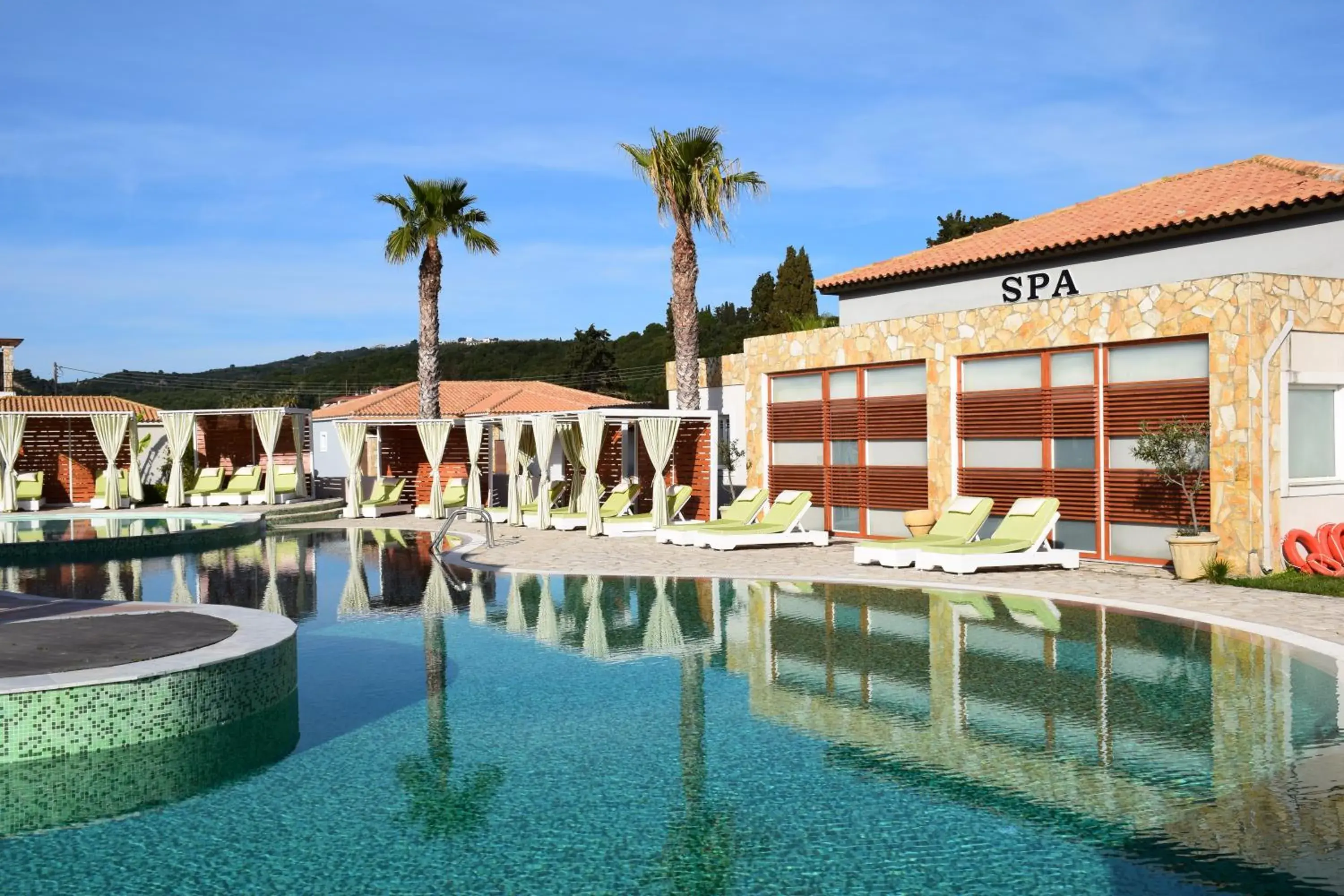 Pool view in Olympia Golden Beach Resort & Spa Pool view in Olympia Golden Beach Resort & Spa