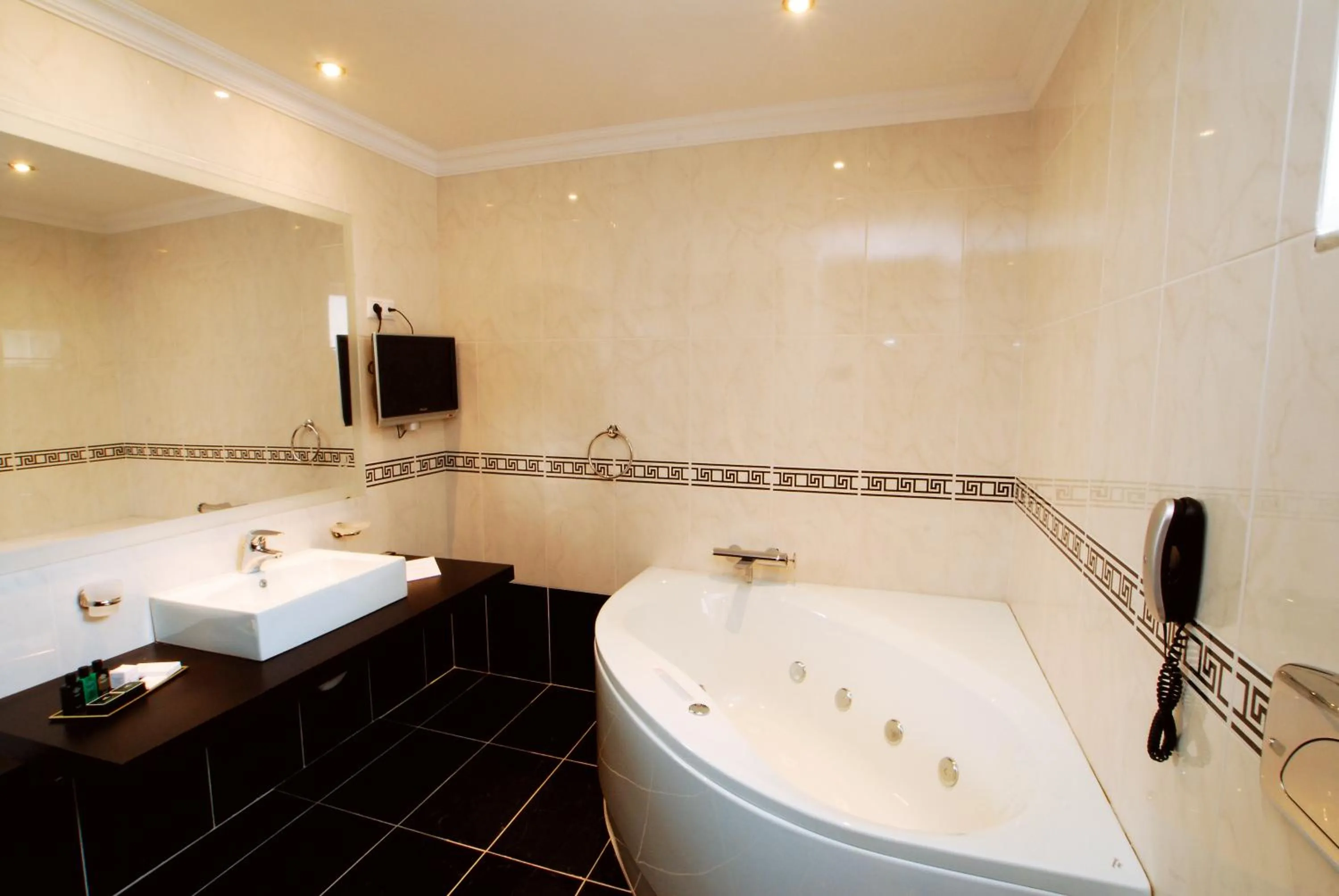 Bathroom in Olympia Golden Beach Resort & Spa