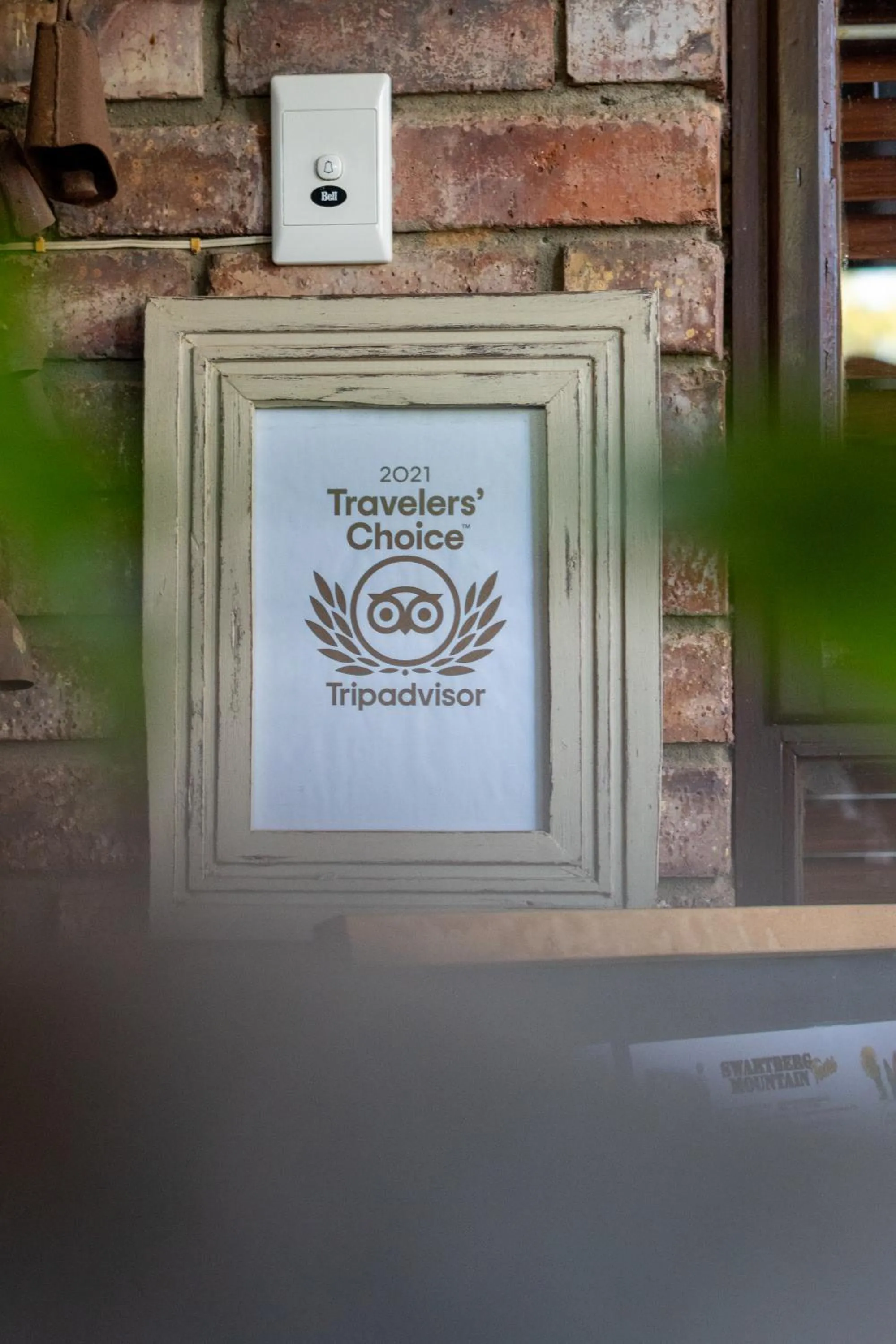 Logo/Certificate/Sign in Earthbound Guest House