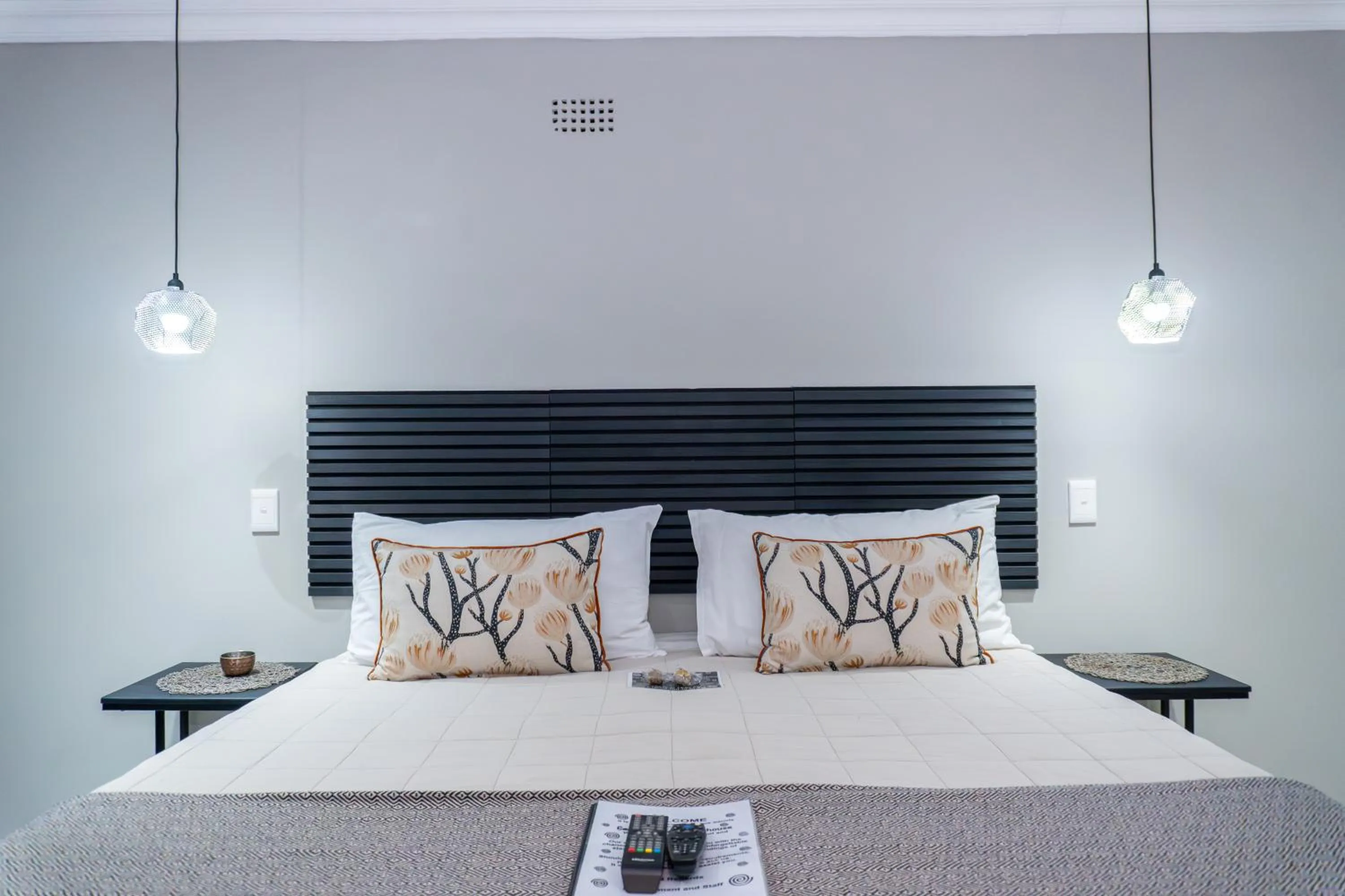 Bed in Earthbound Guest House