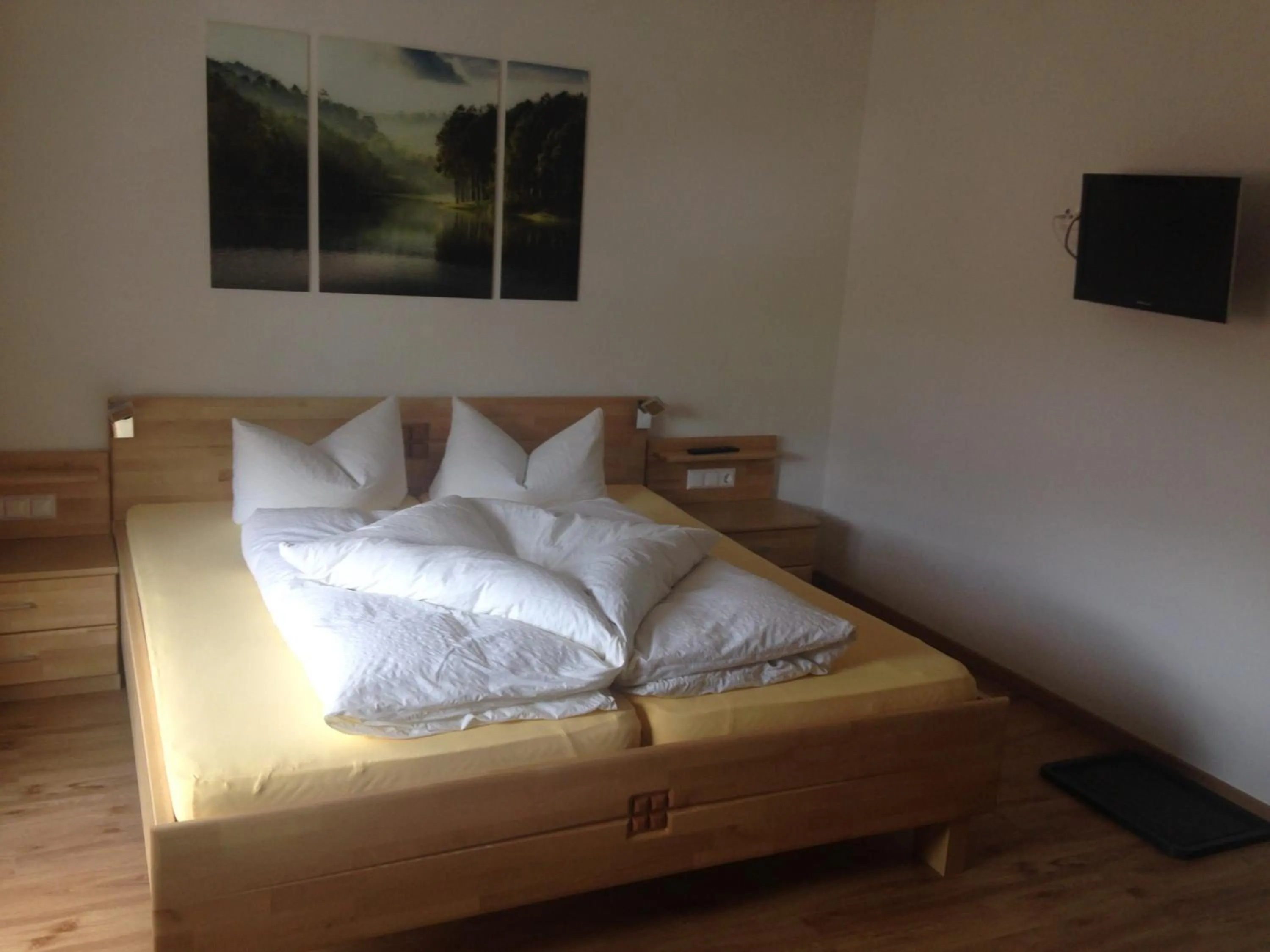 Photo of the whole room, Bed in Landhaus Engadin
