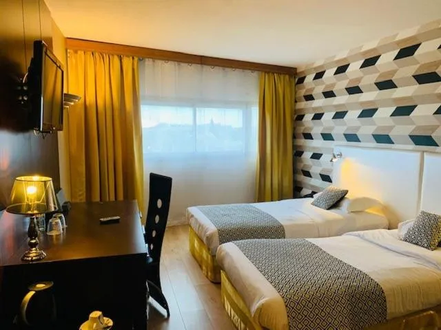 Bed in Grand Hôtel de Nîmes 4 étoiles