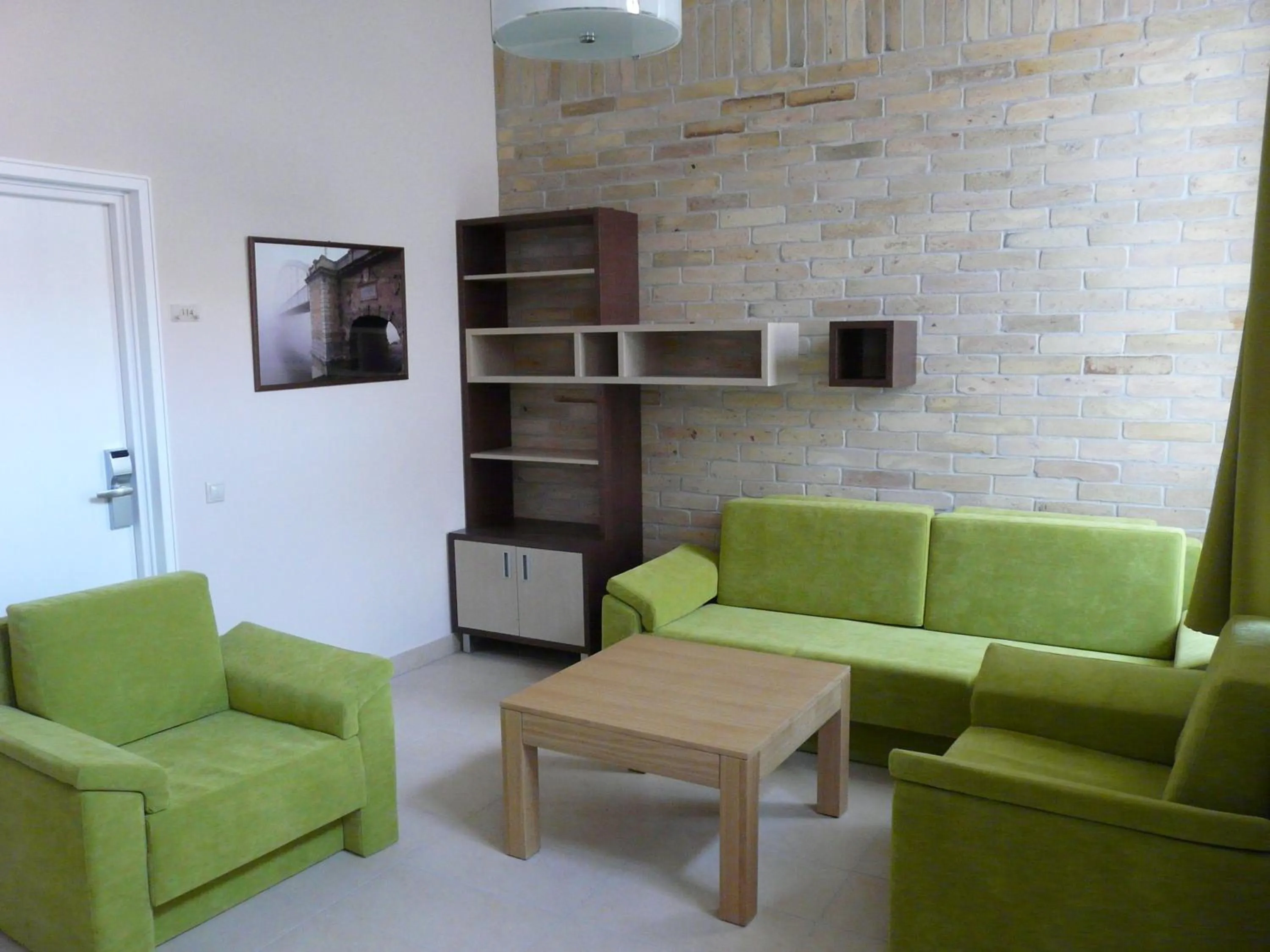 Communal lounge/ TV room in Soleil Apartman Szeged