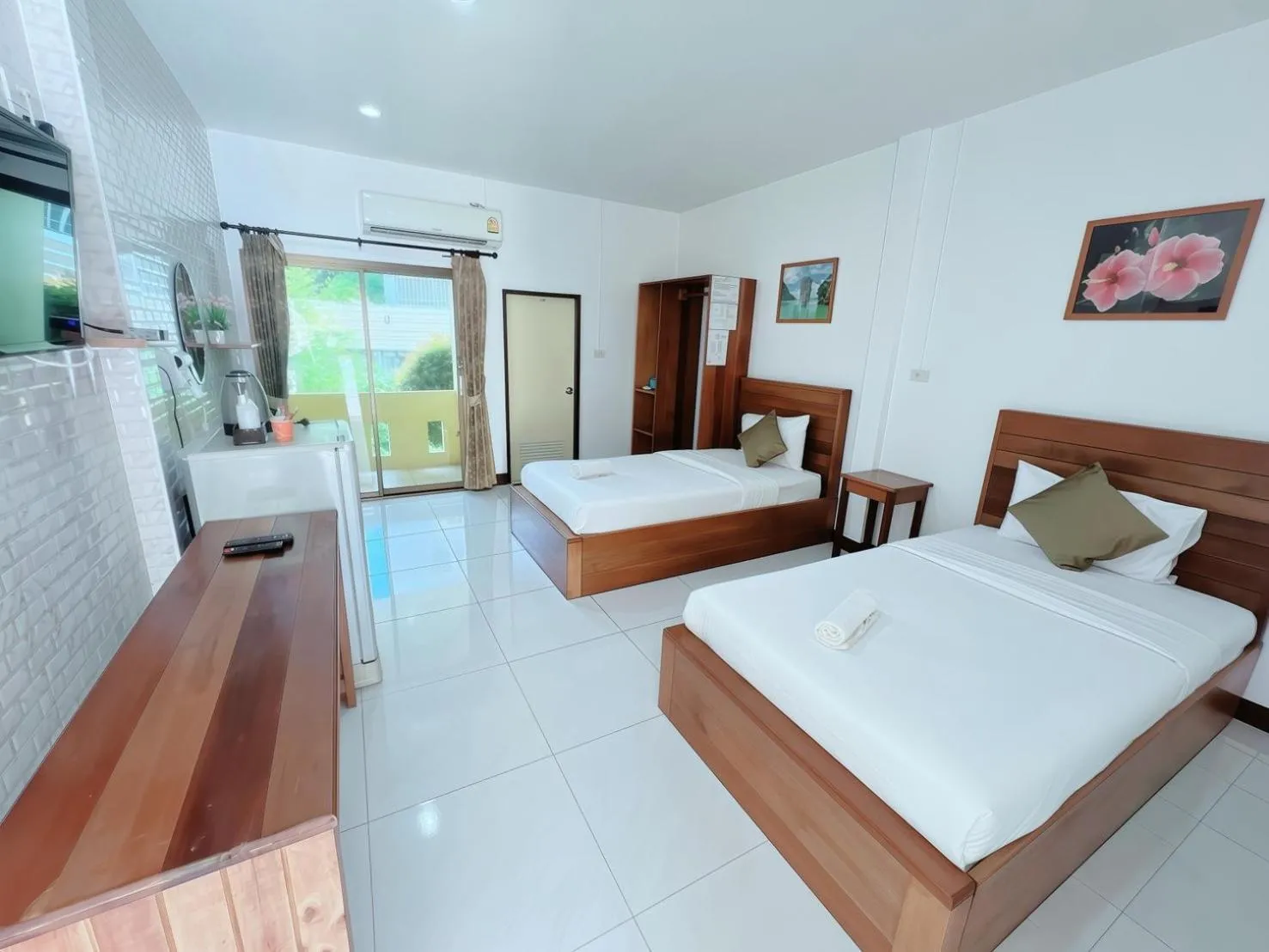 Bed in Rachawadee House Phang Nga