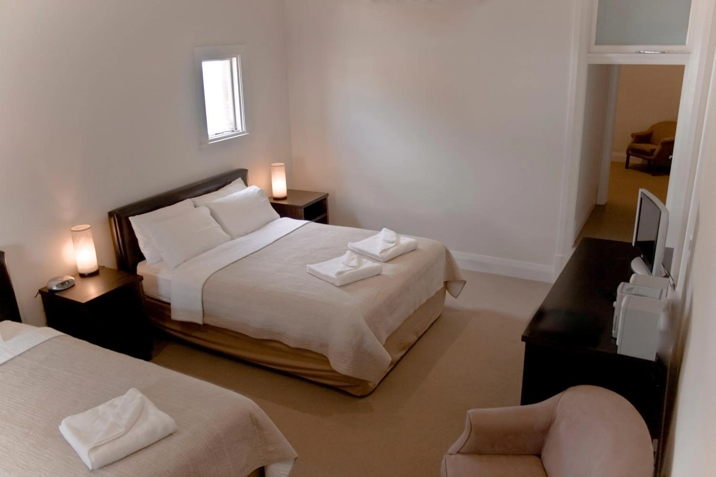 Bed in The Bridgetown Hotel