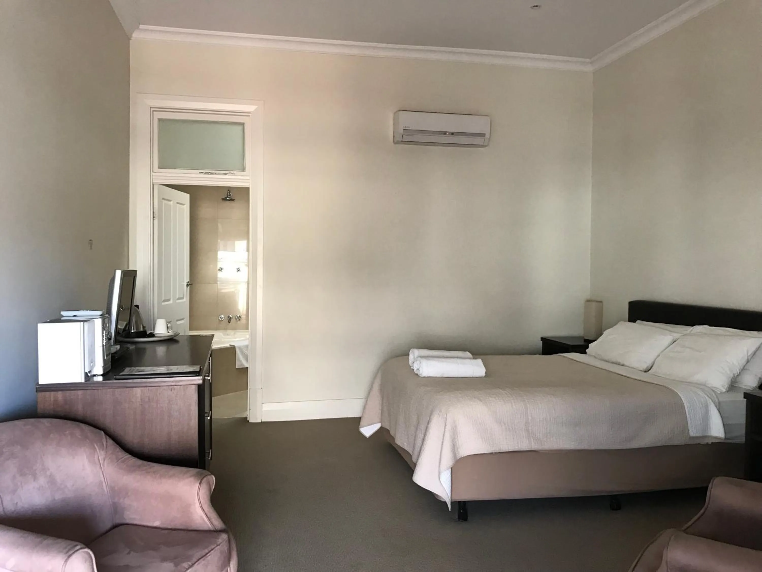 Bed in The Bridgetown Hotel