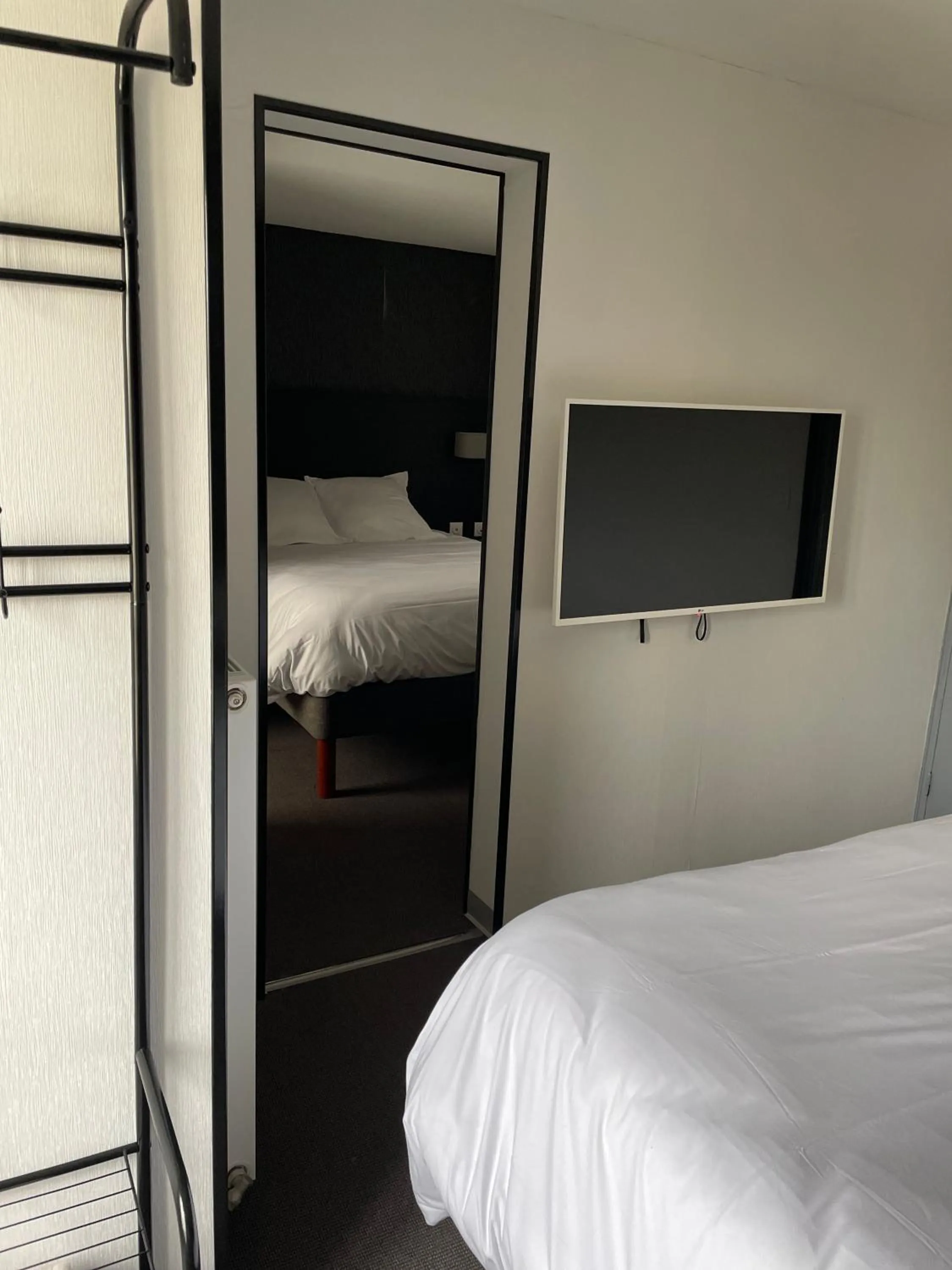 Bed in Beau Rivage Hôtel-Restaurant