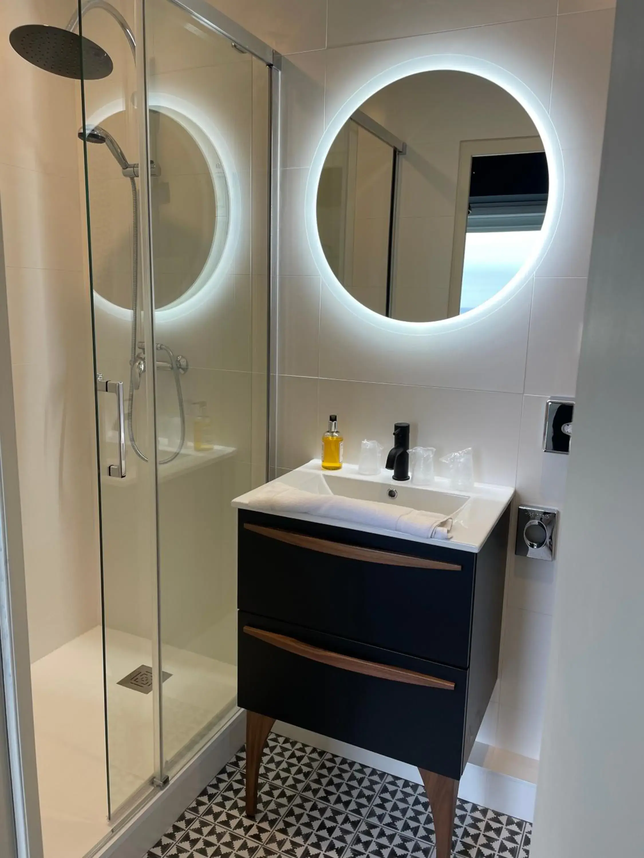 Bathroom in Beau Rivage Hôtel-Restaurant Bathroom in Beau Rivage Hôtel-Restaurant