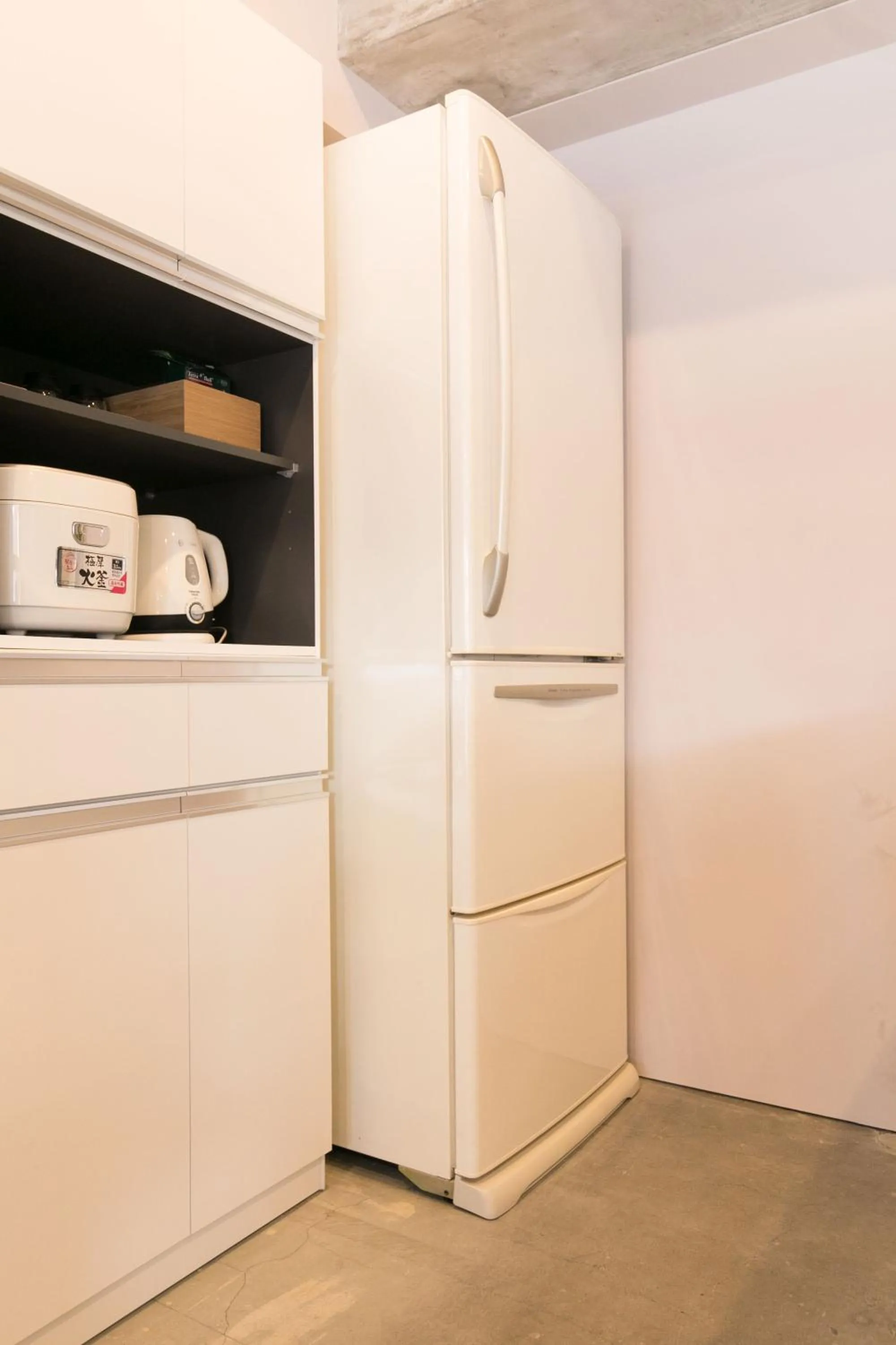 Communal kitchen in hostel DEN