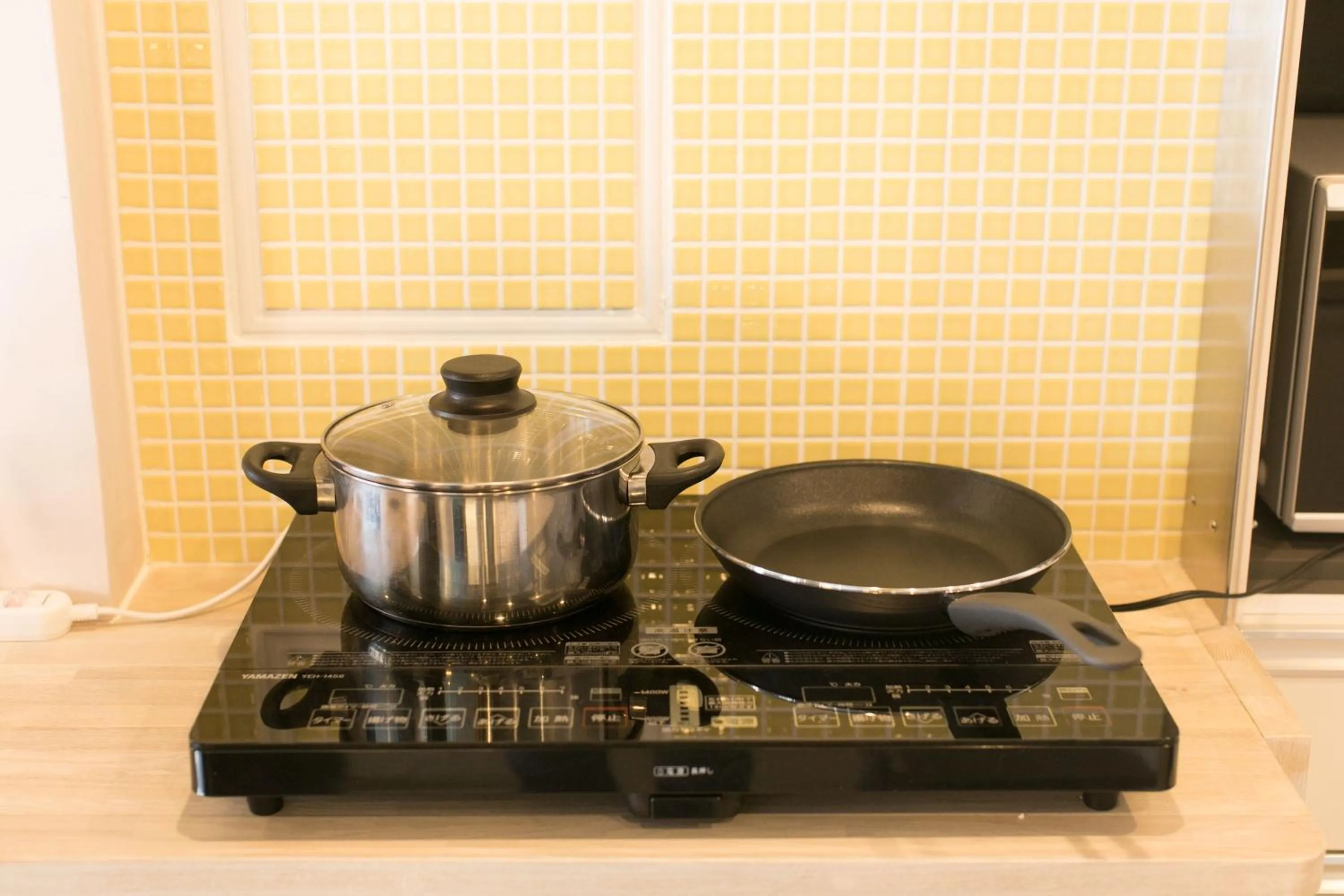Communal kitchen in hostel DEN