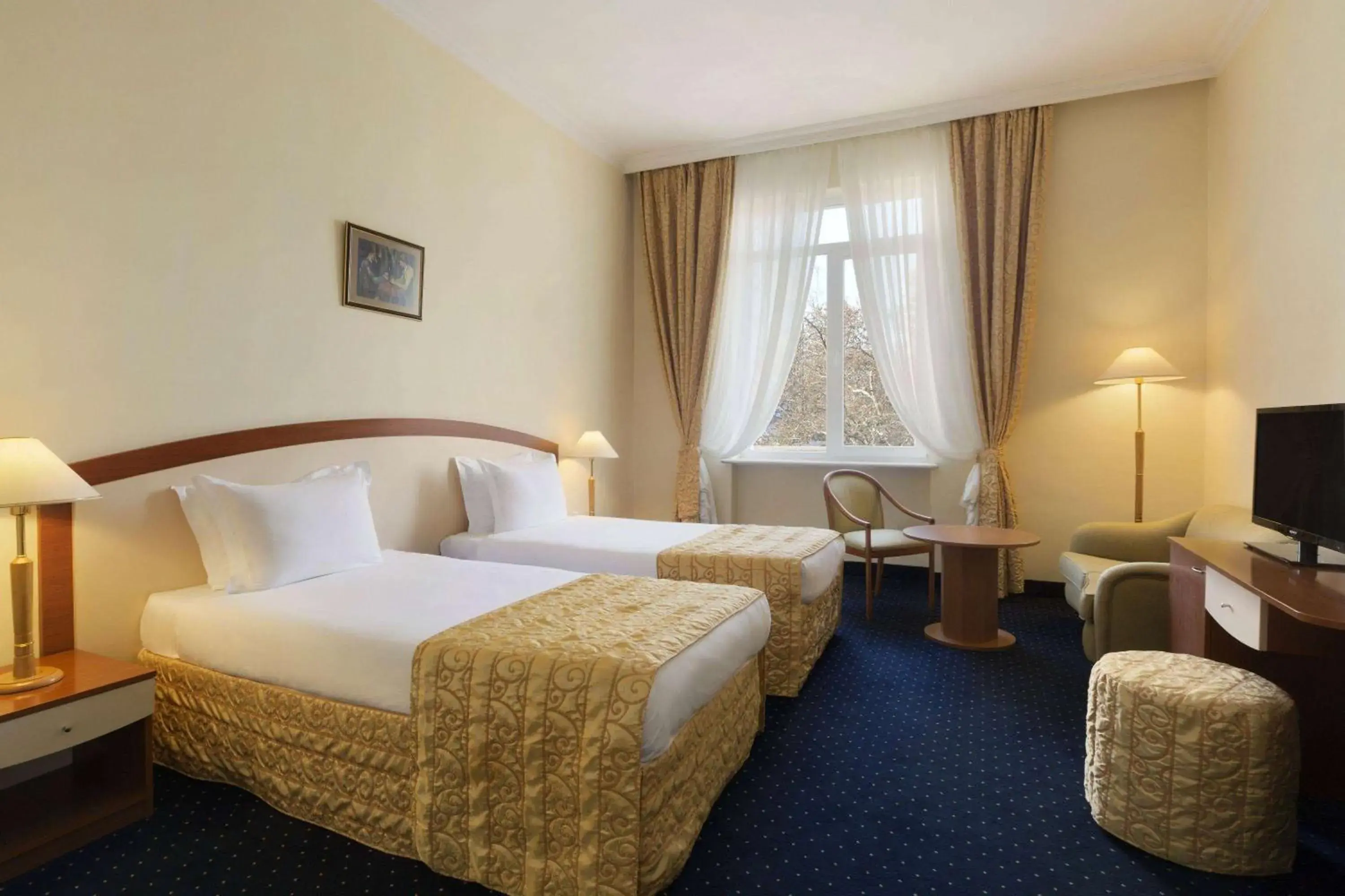 Photo of the whole room, Bed in Ramada by Wyndham Plovdiv Trimontium Photo of the whole room, Bed in Ramada by Wyndham Plovdiv Trimontium