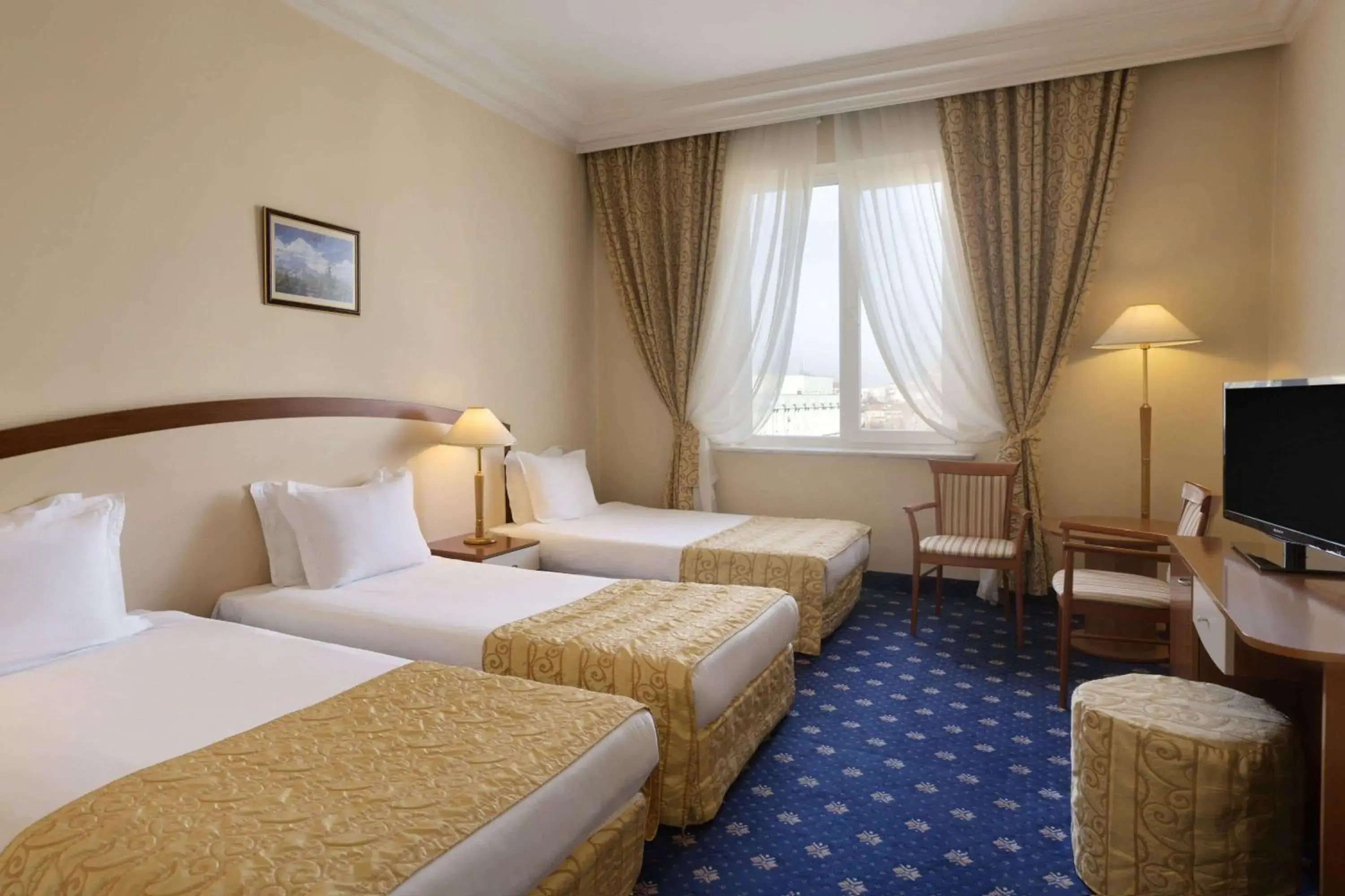 Photo of the whole room, Bed in Ramada by Wyndham Plovdiv Trimontium Photo of the whole room, Bed in Ramada by Wyndham Plovdiv Trimontium